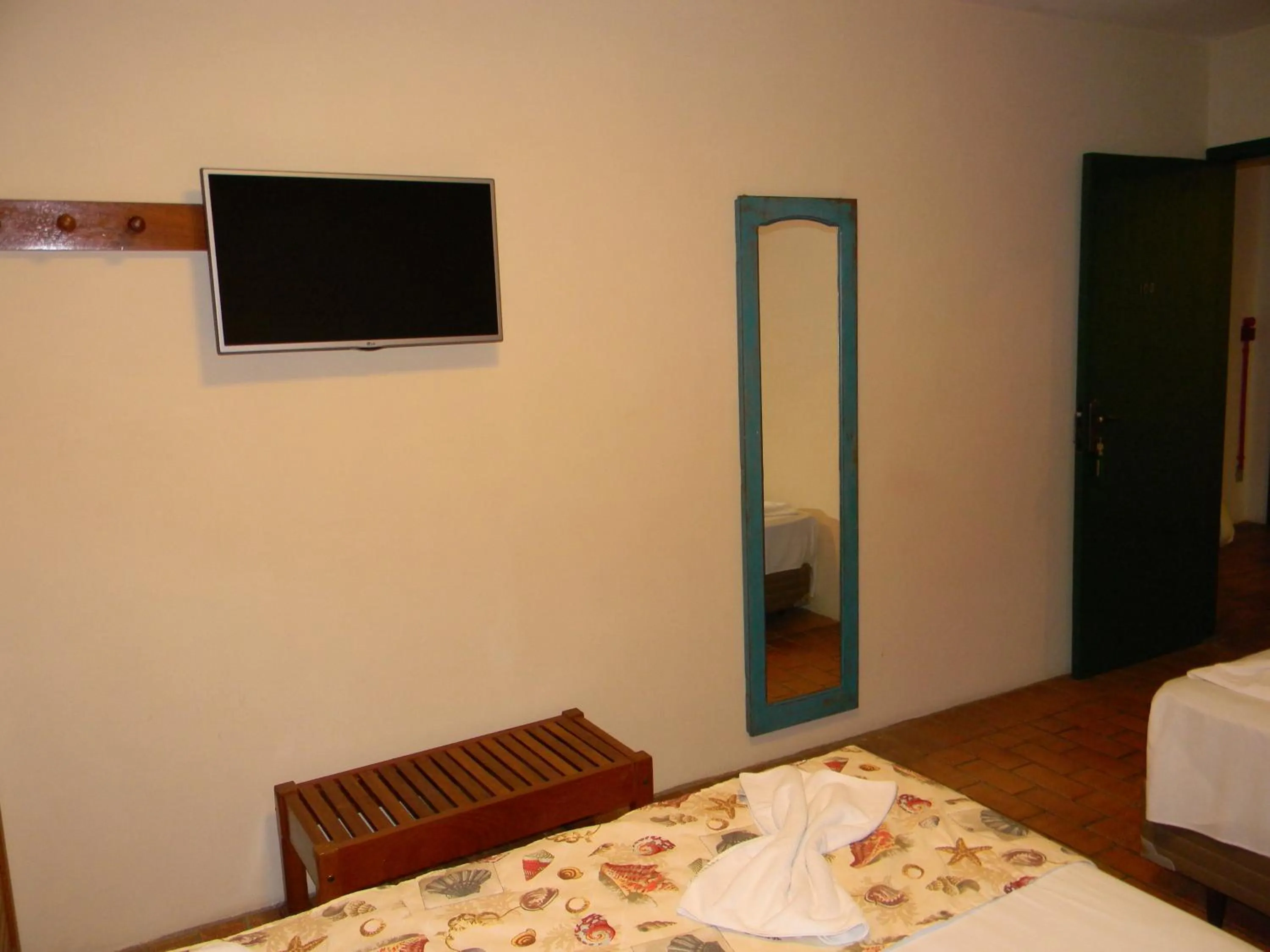 Bed in Pousada Recanto da Prainha