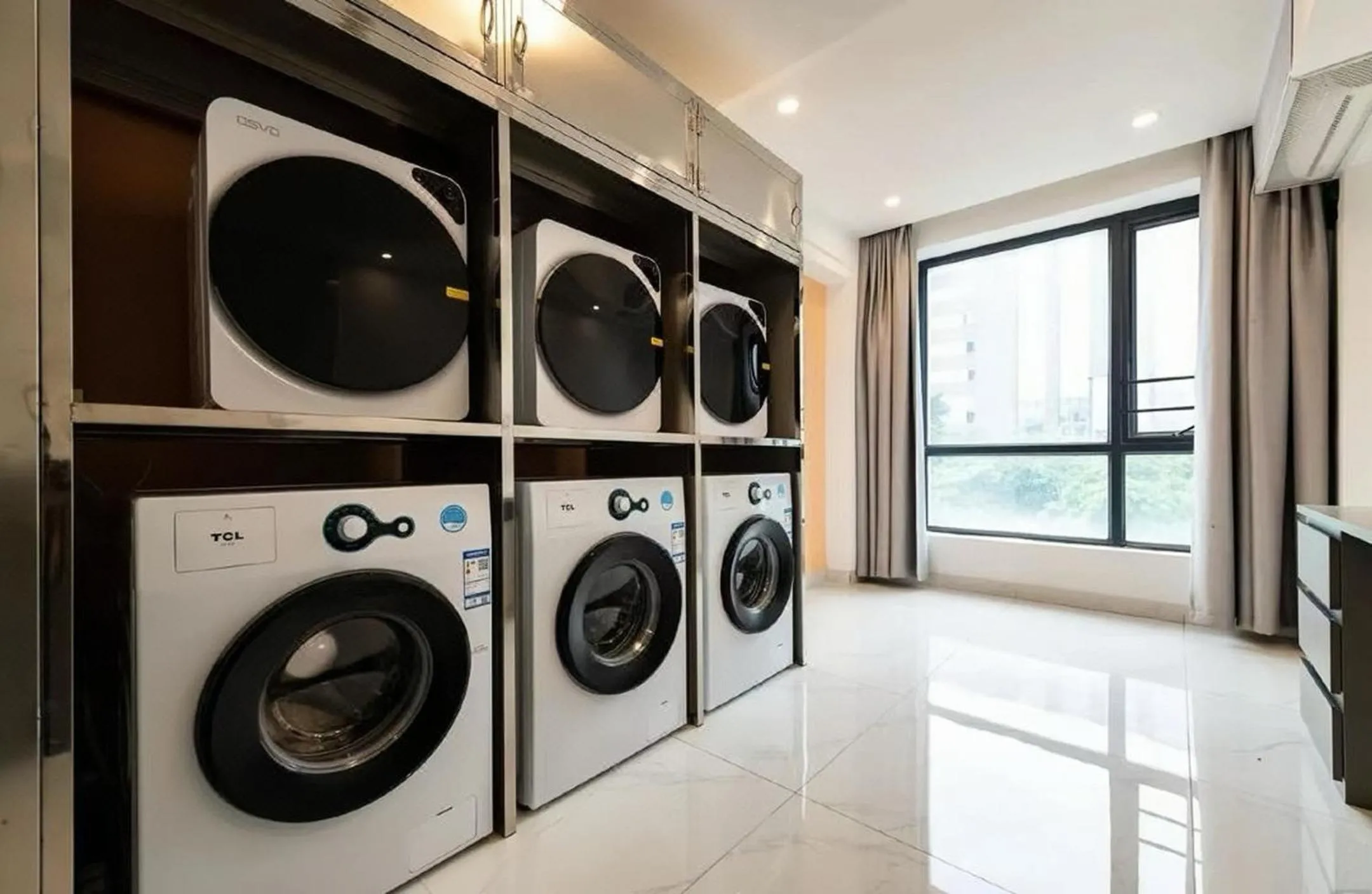 washing machine in ParkHeng Hotel Shenzhen World Exhibition & Convention Center Branch
