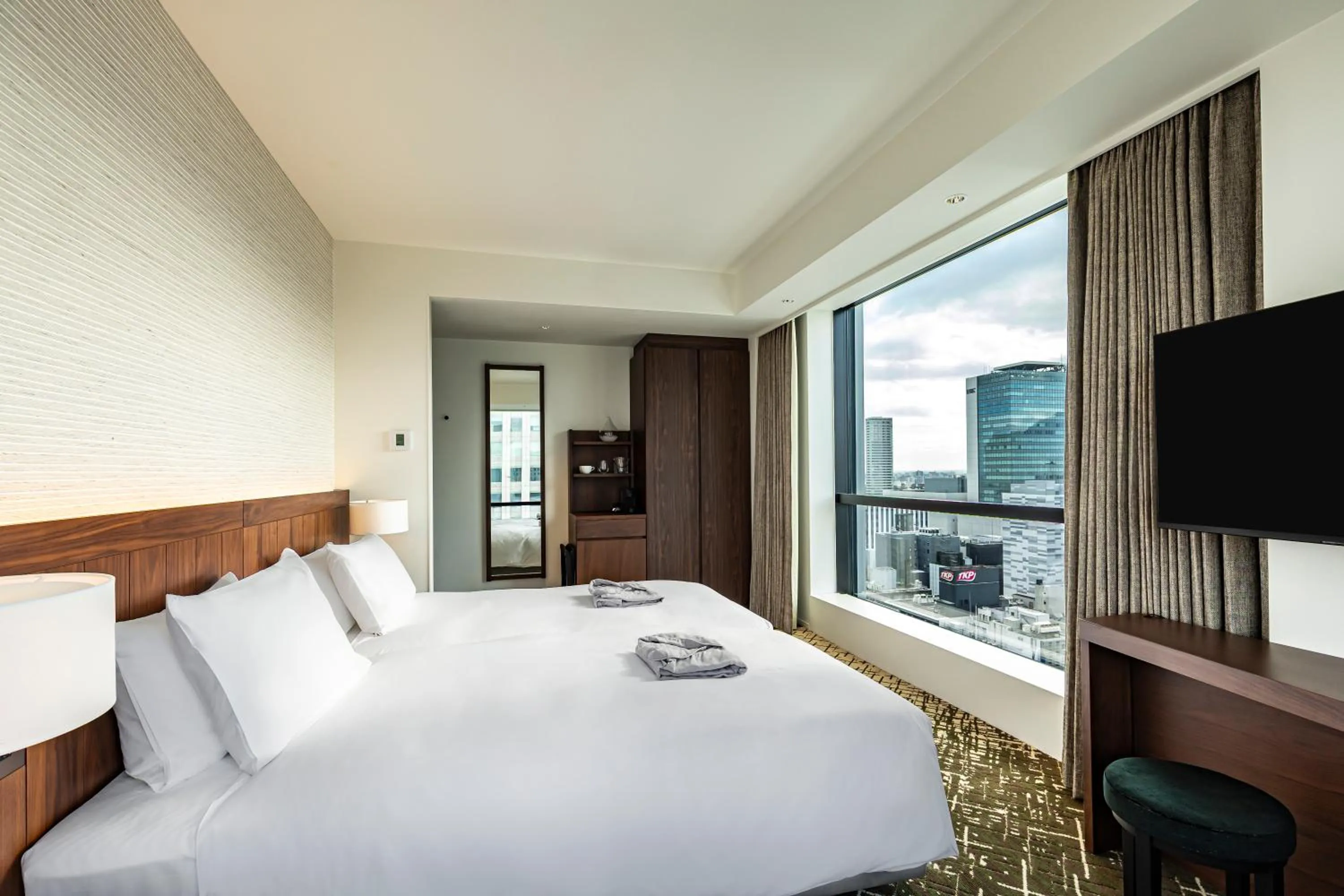 Bed in The Gate Hotel Sapporo by Hulic