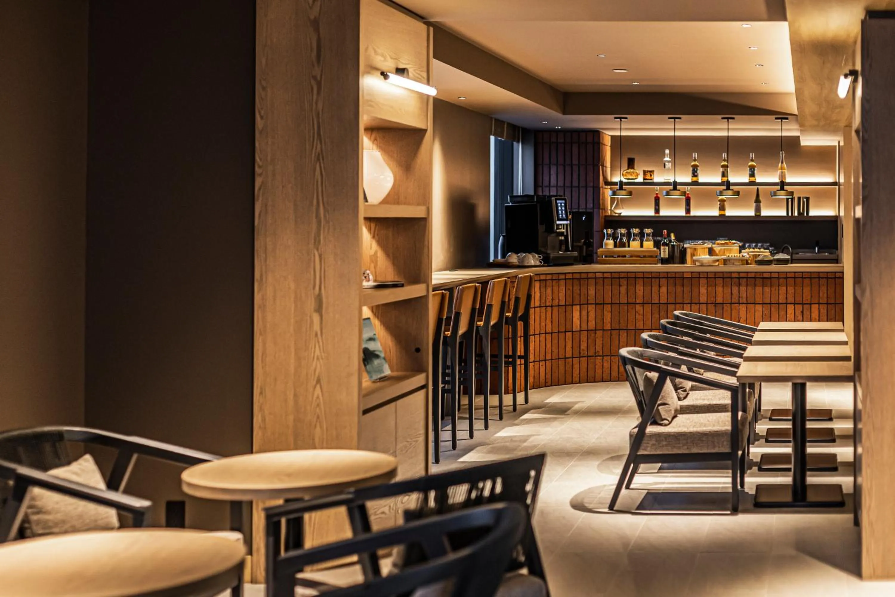 Lounge or bar in The Gate Hotel Sapporo by Hulic