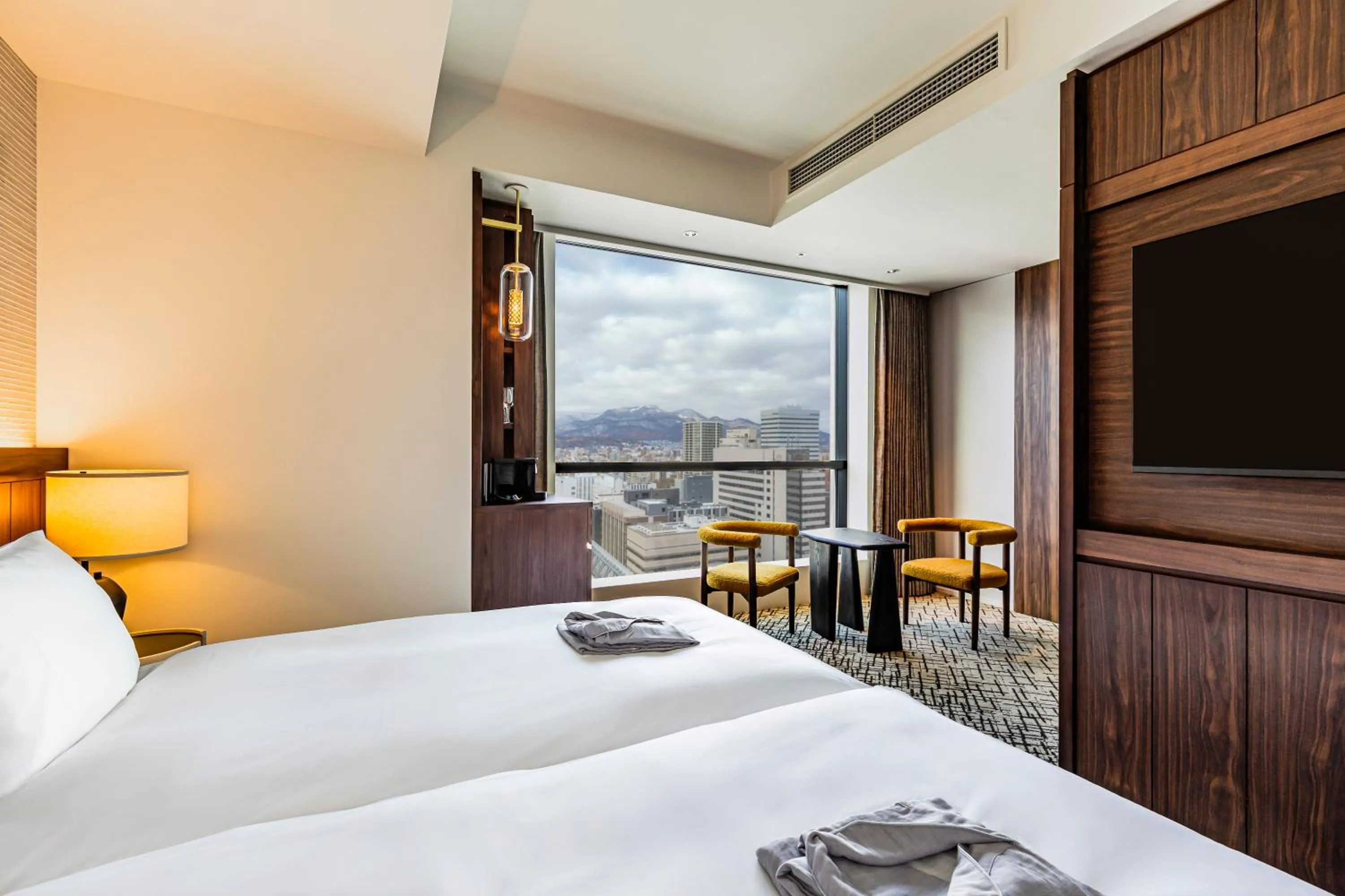 Bed in The Gate Hotel Sapporo by Hulic