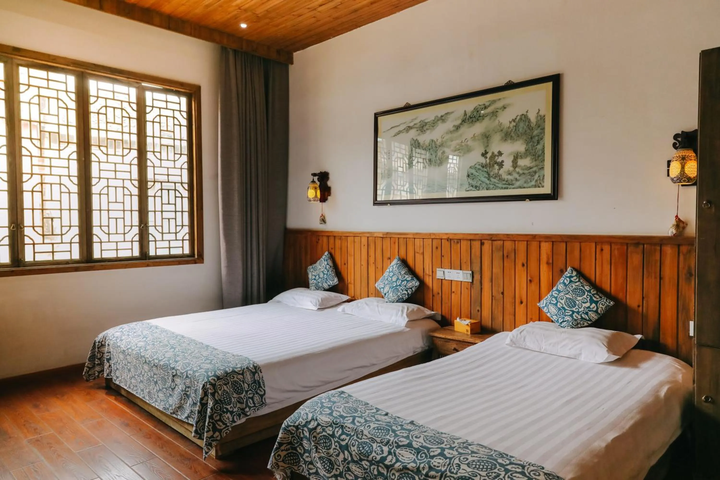 Bed in September Huizhou Inn