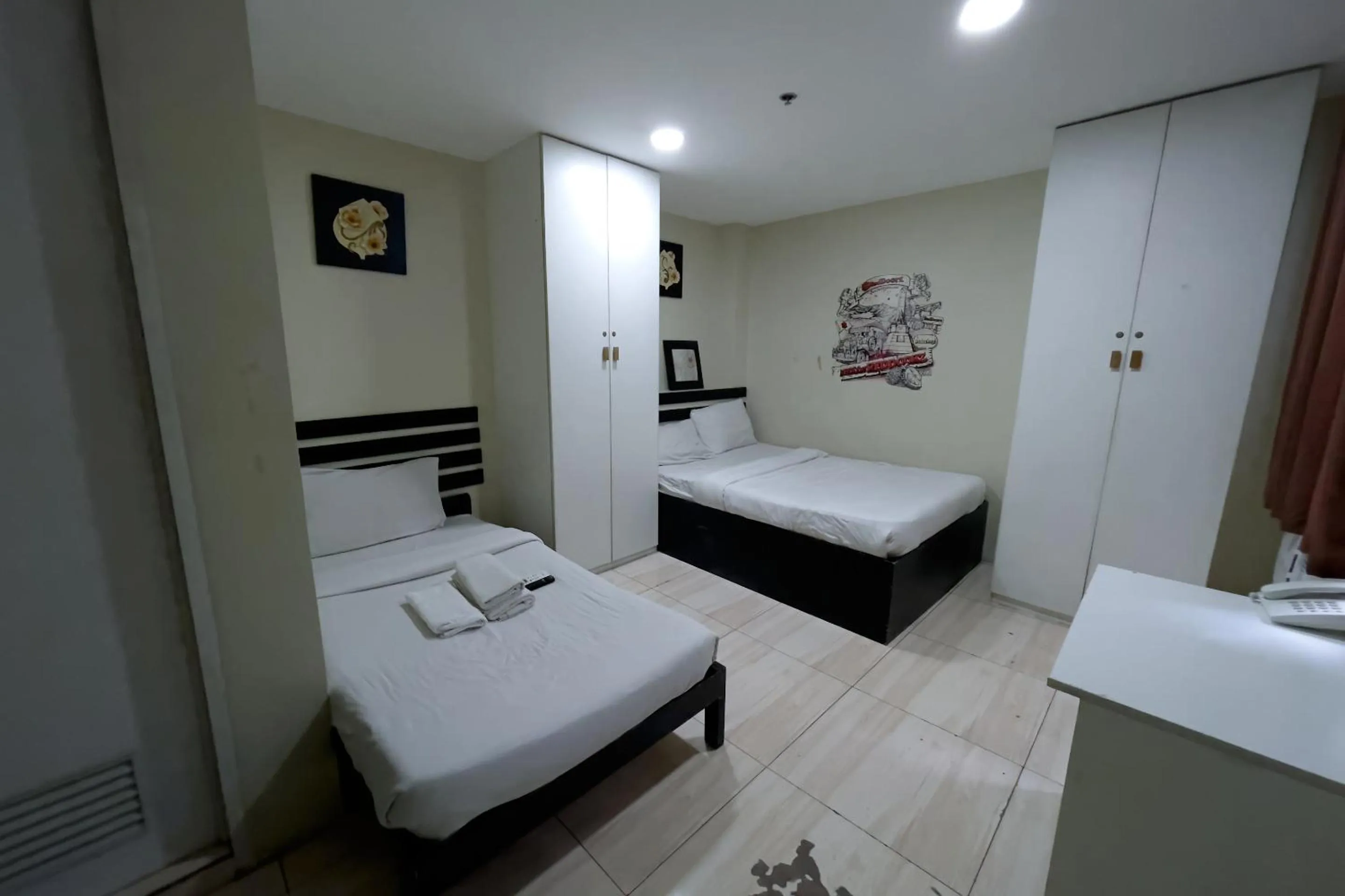 Bed in Jardin Oriental Suites Ubelt Manila