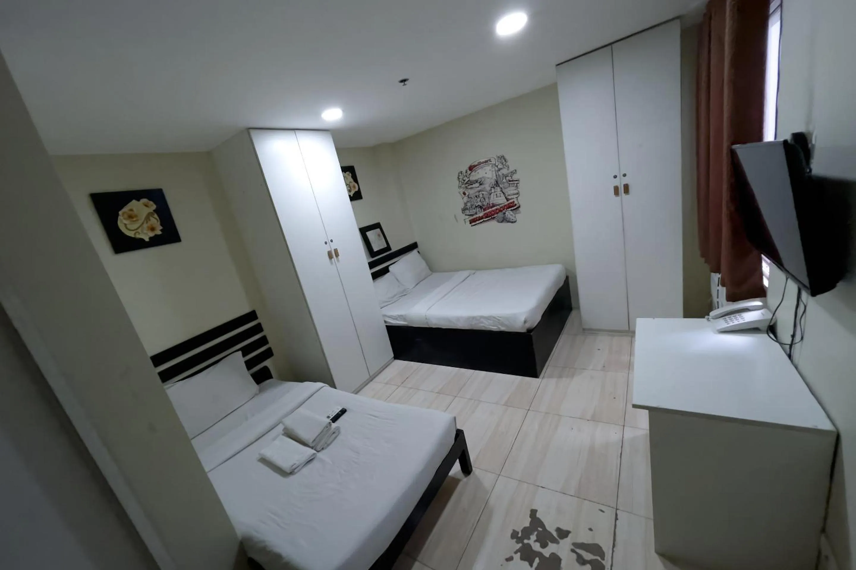 Bed in Jardin Oriental Suites Ubelt Manila