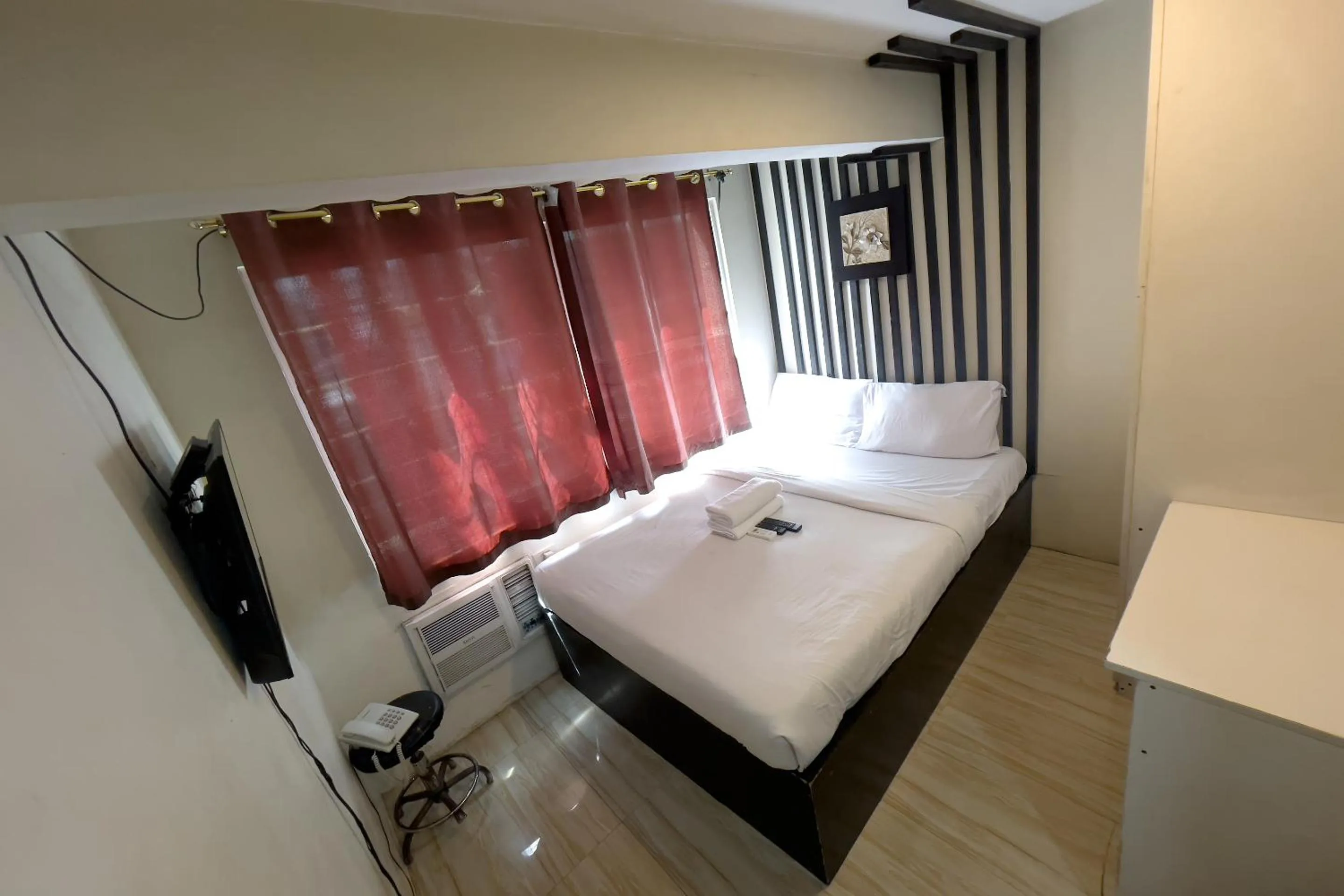 Bed in Jardin Oriental Suites Ubelt Manila