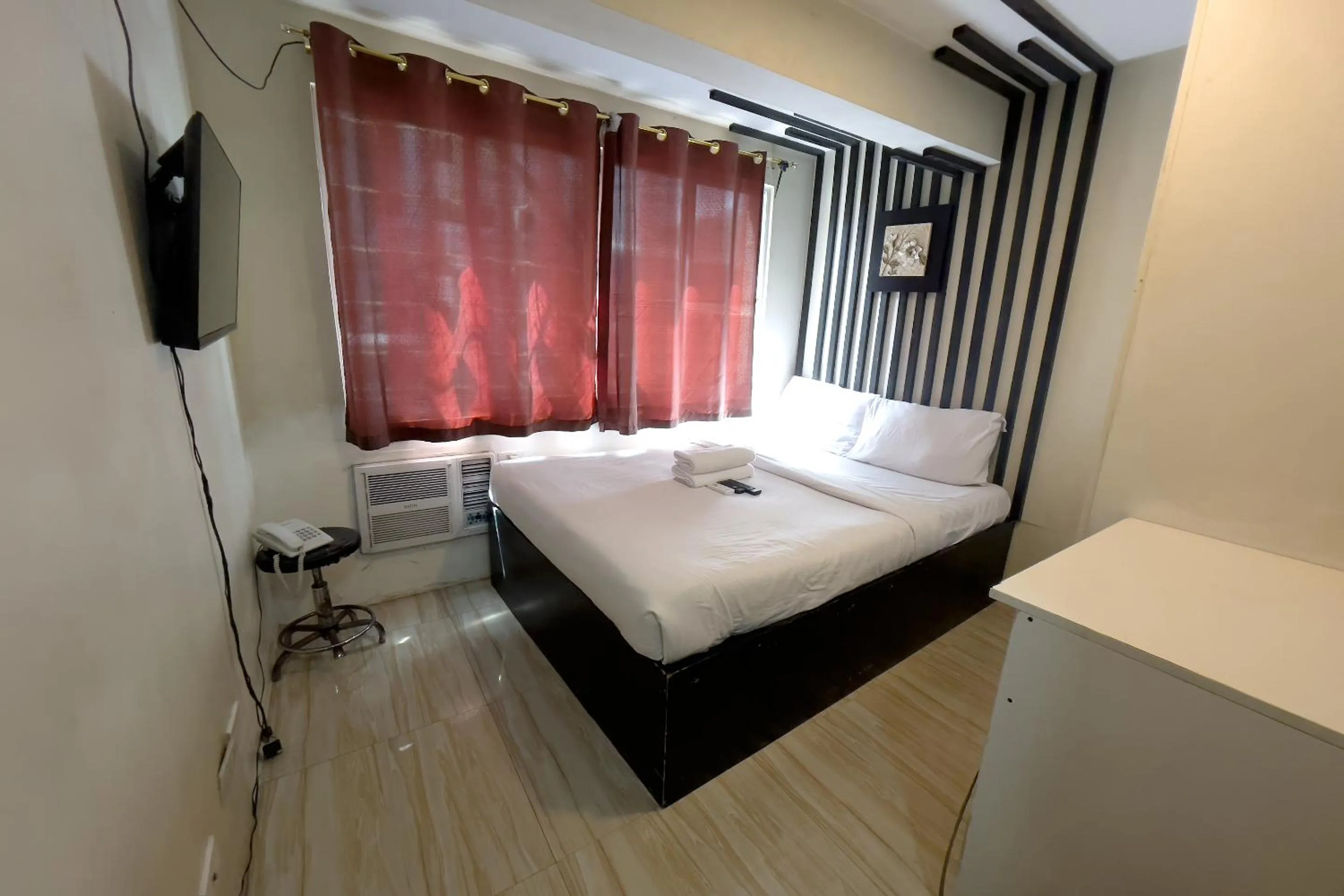 Bed in Jardin Oriental Suites Ubelt Manila