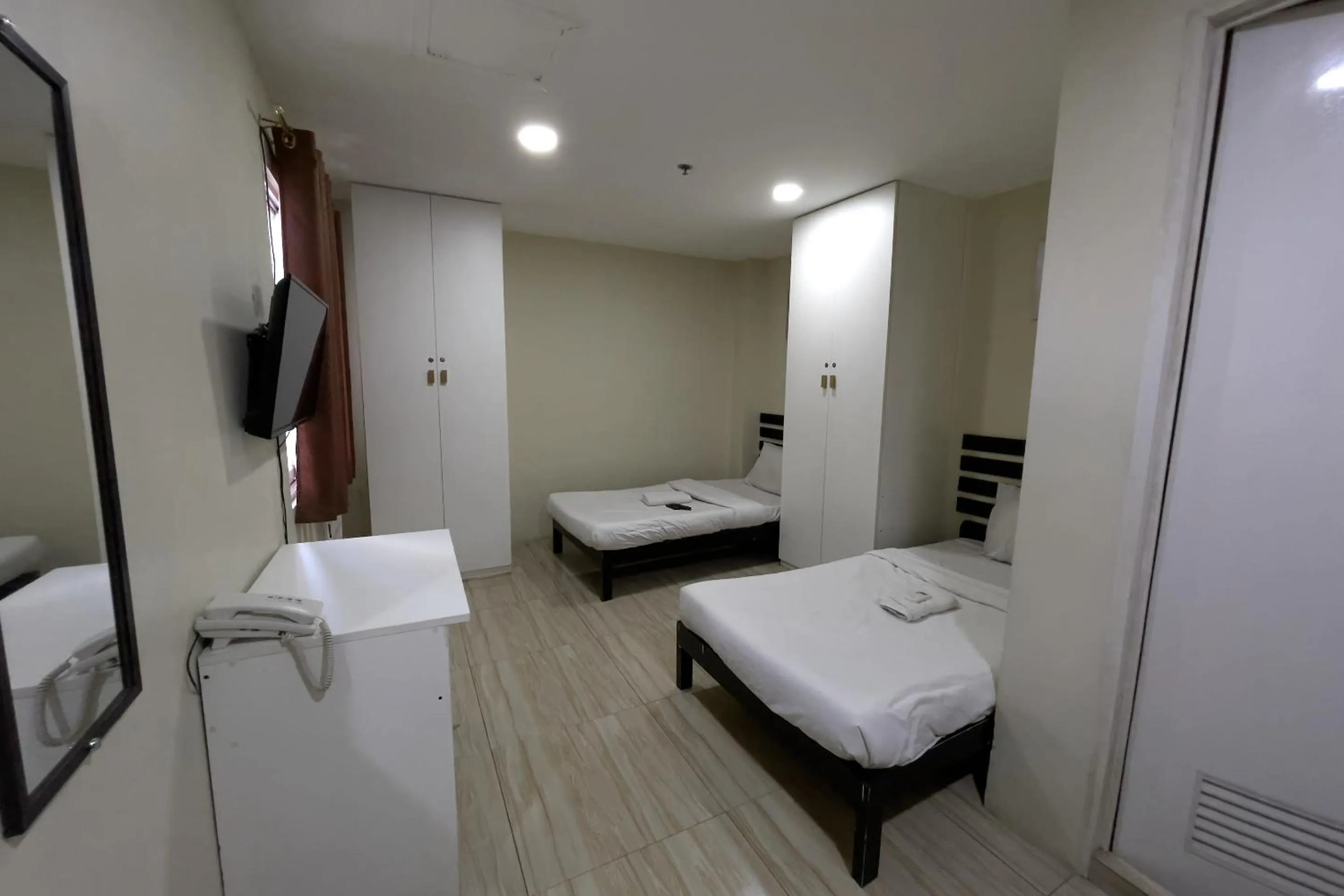 Bed in Jardin Oriental Suites Ubelt Manila