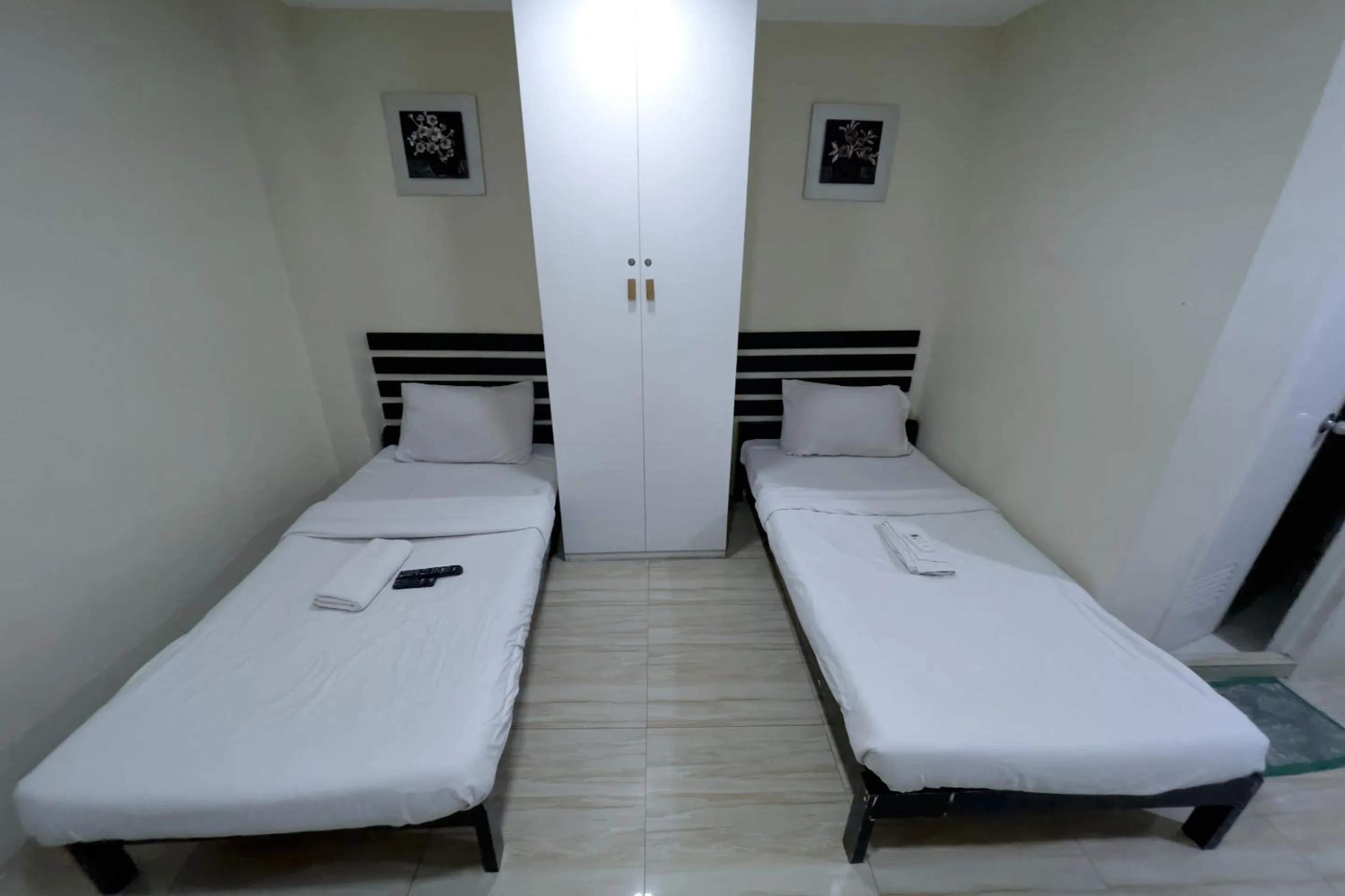 Bed in Jardin Oriental Suites Ubelt Manila