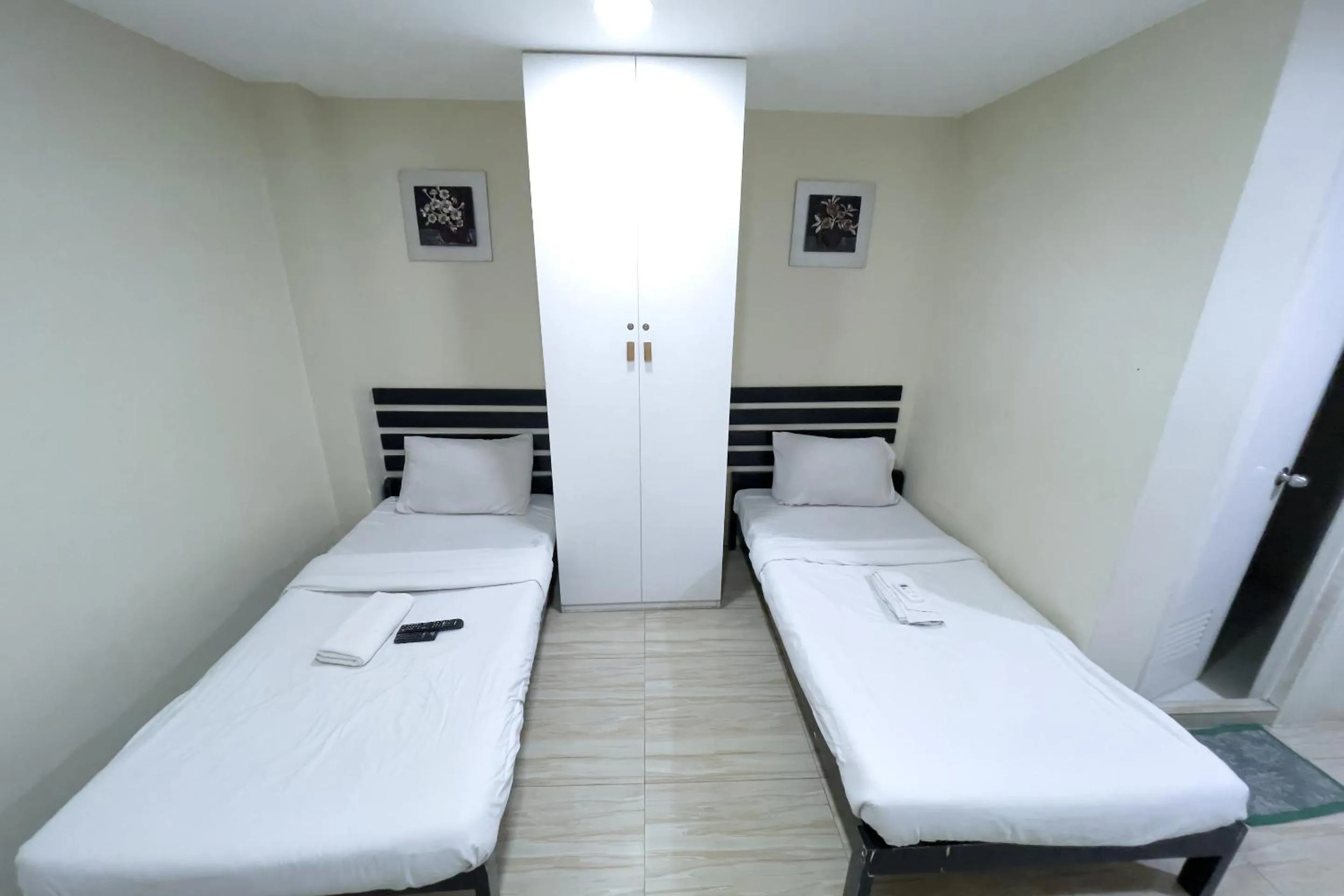 Bed in Jardin Oriental Suites Ubelt Manila