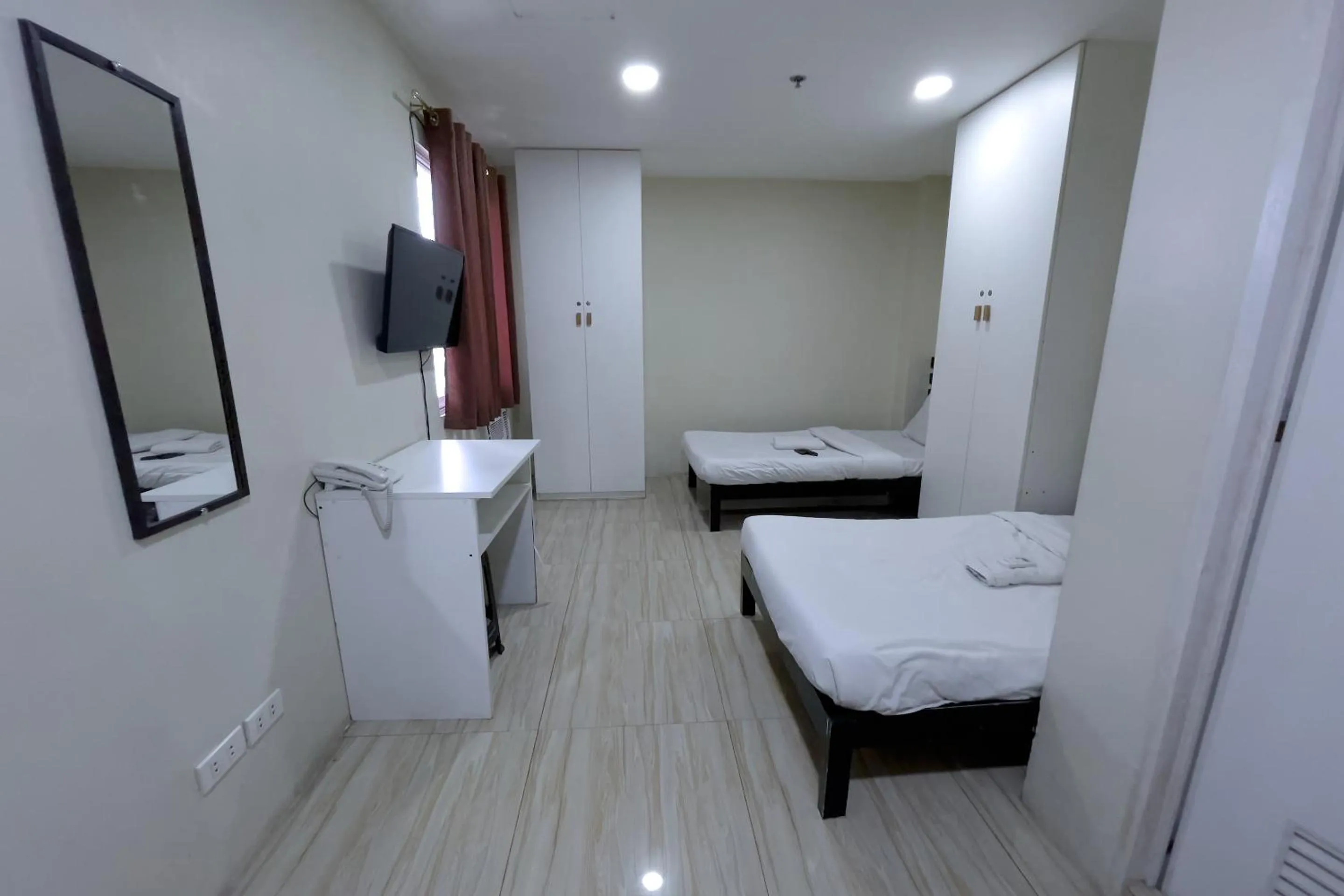 Bed in Jardin Oriental Suites Ubelt Manila