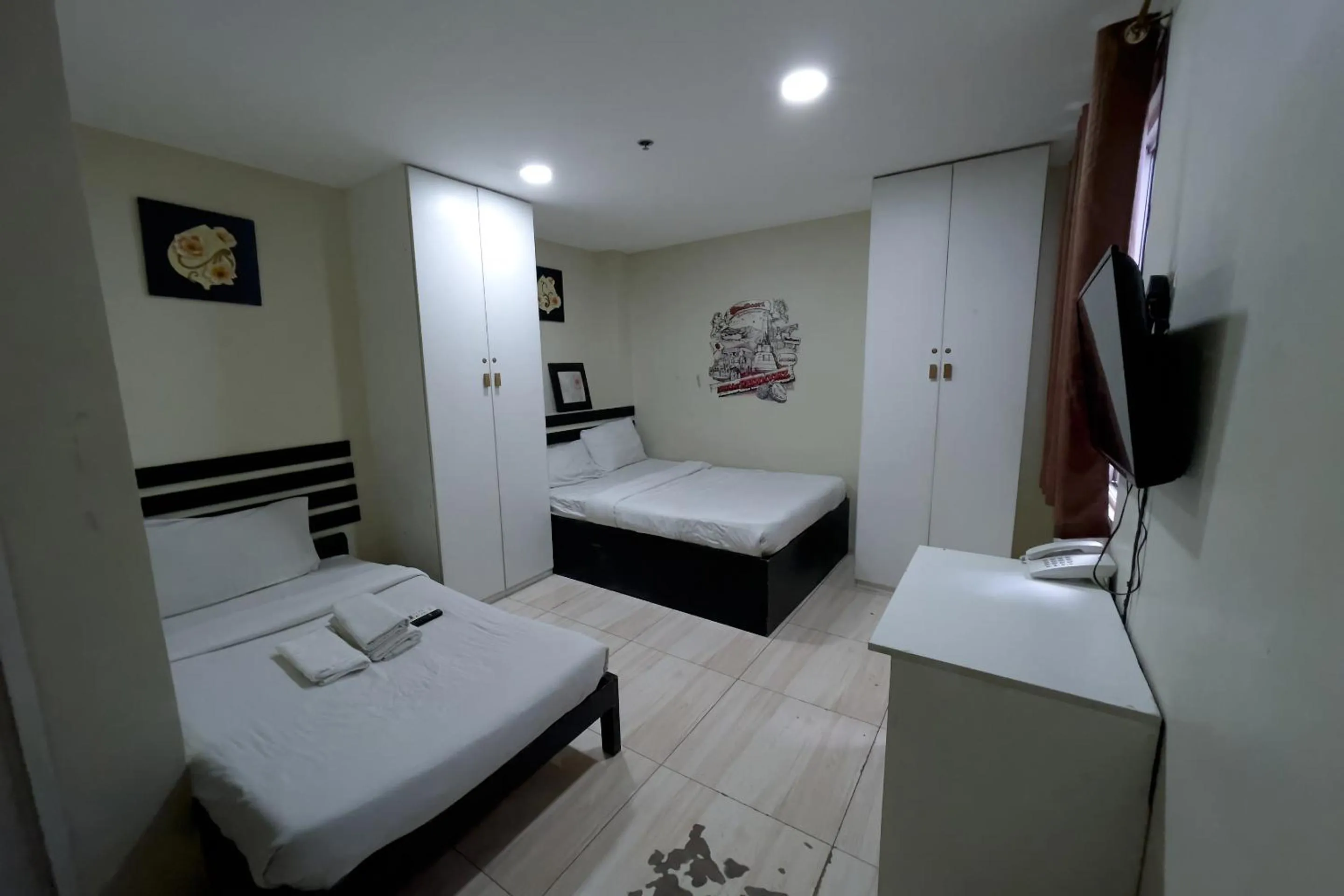 Bed in Jardin Oriental Suites Ubelt Manila