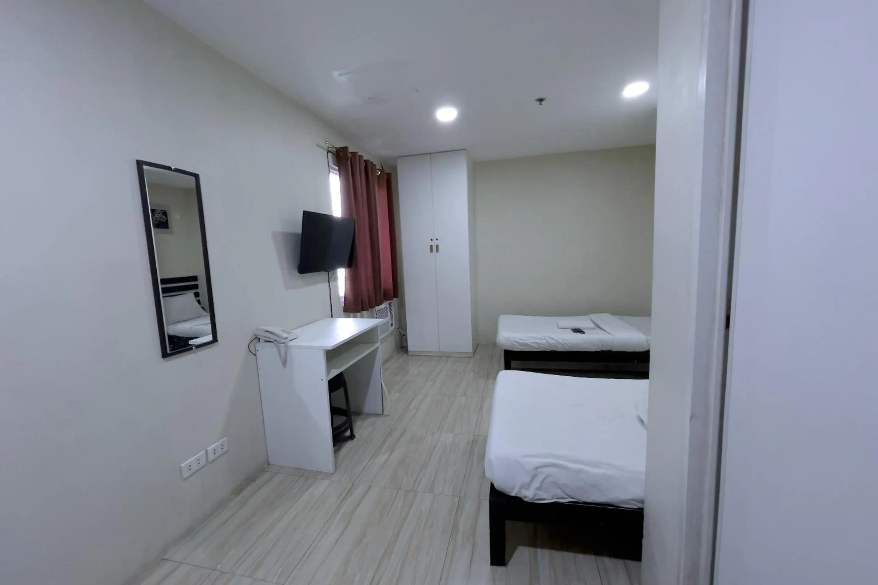 Bed in Jardin Oriental Suites Ubelt Manila