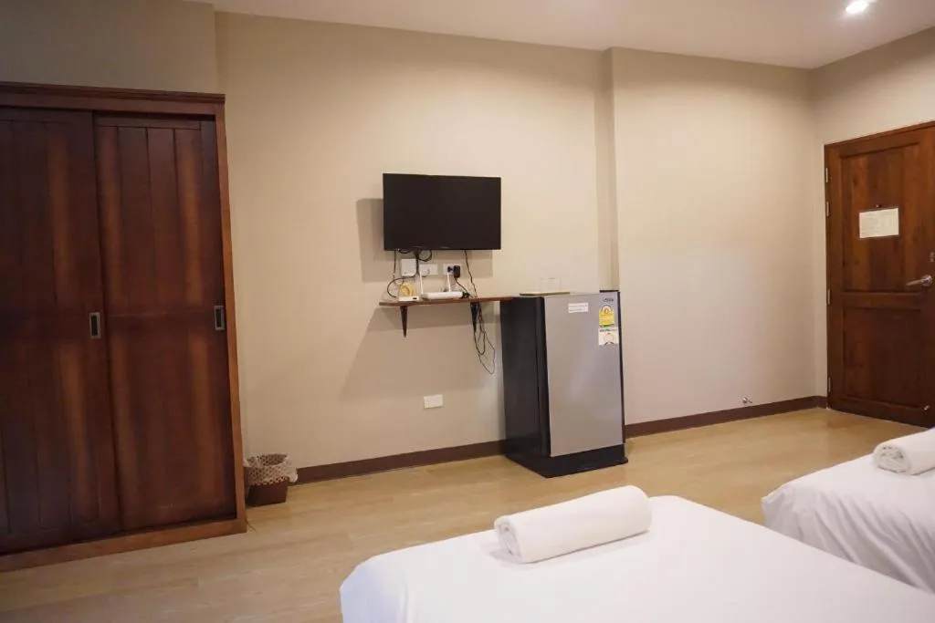 Bed in Chompu Nakarin Apartment