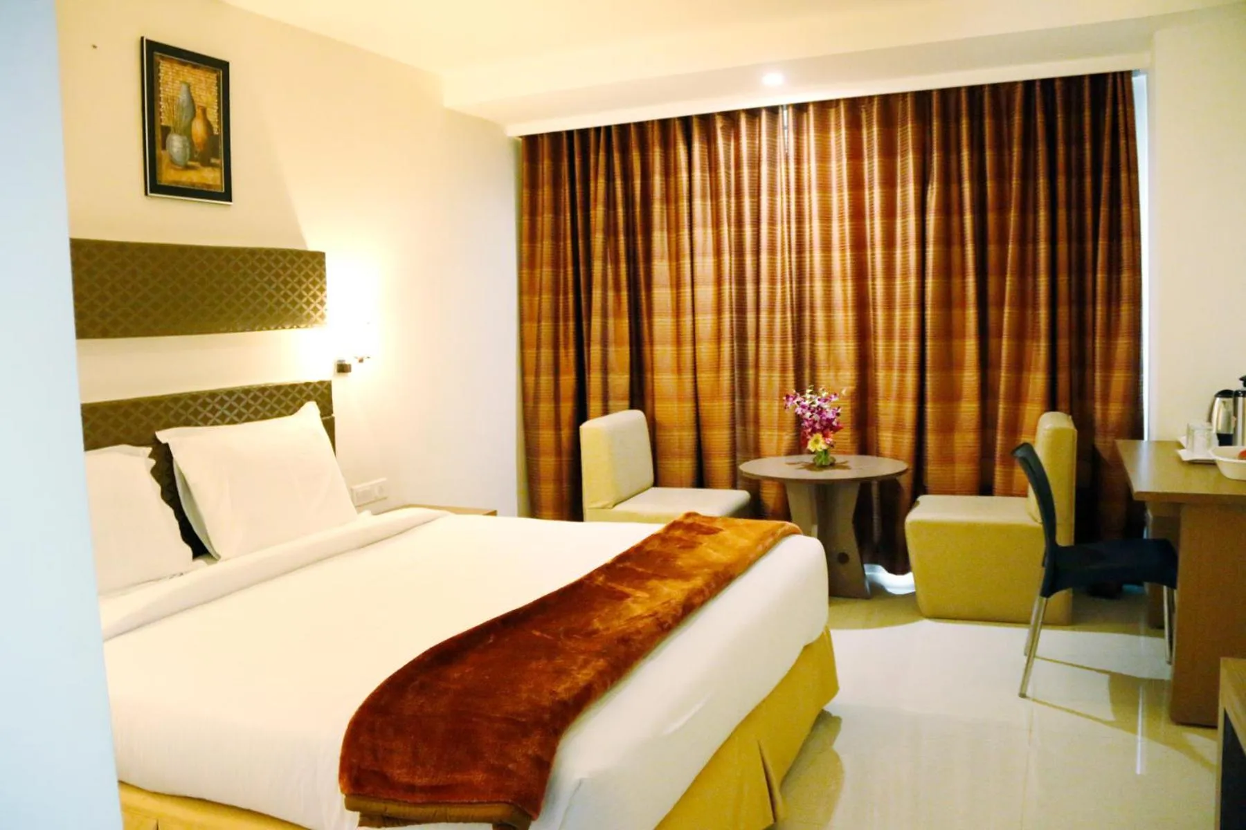 Bed in Hotel Sitara Grand Miyapur