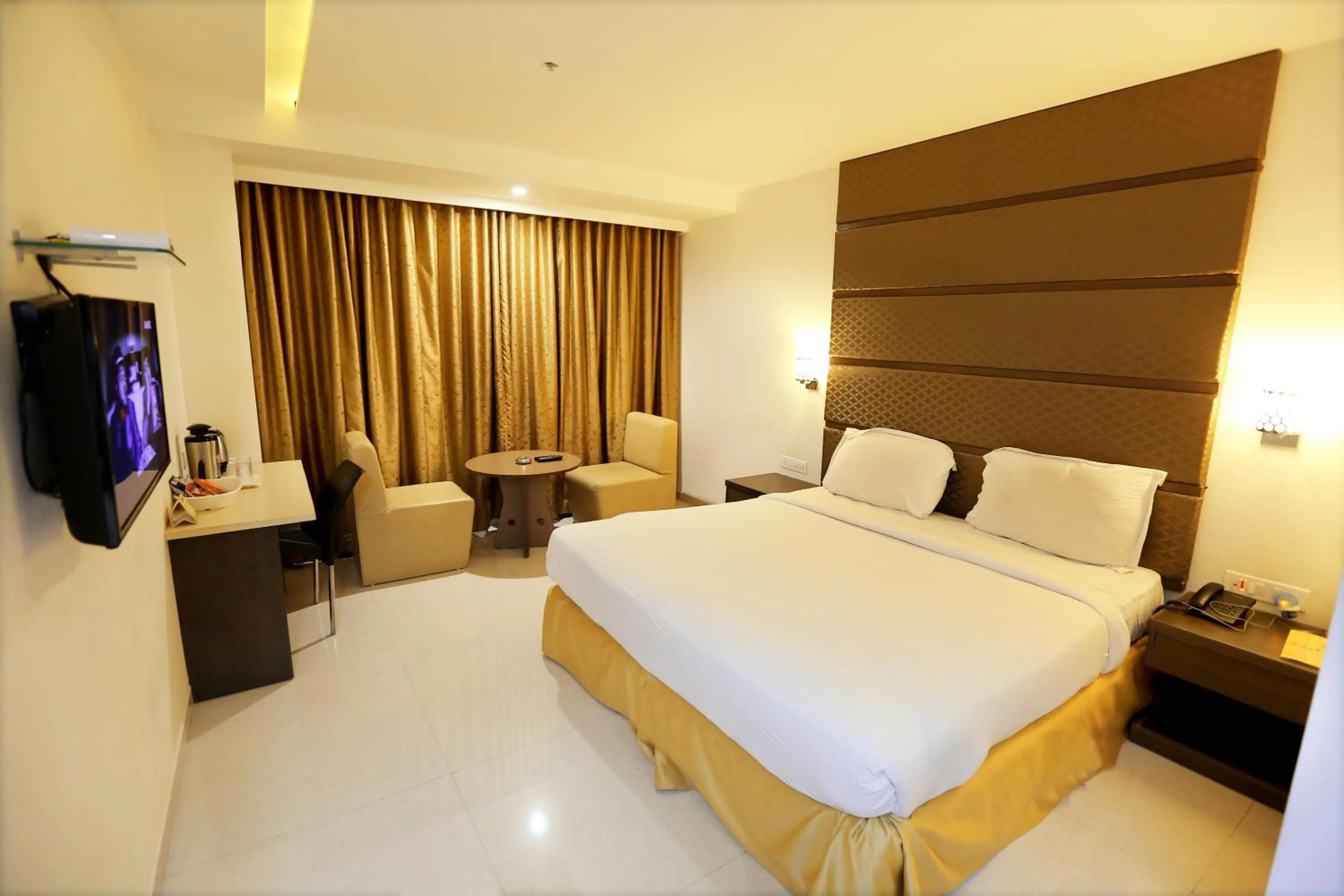 Photo of the whole room, Bed in Hotel Sitara Grand Miyapur