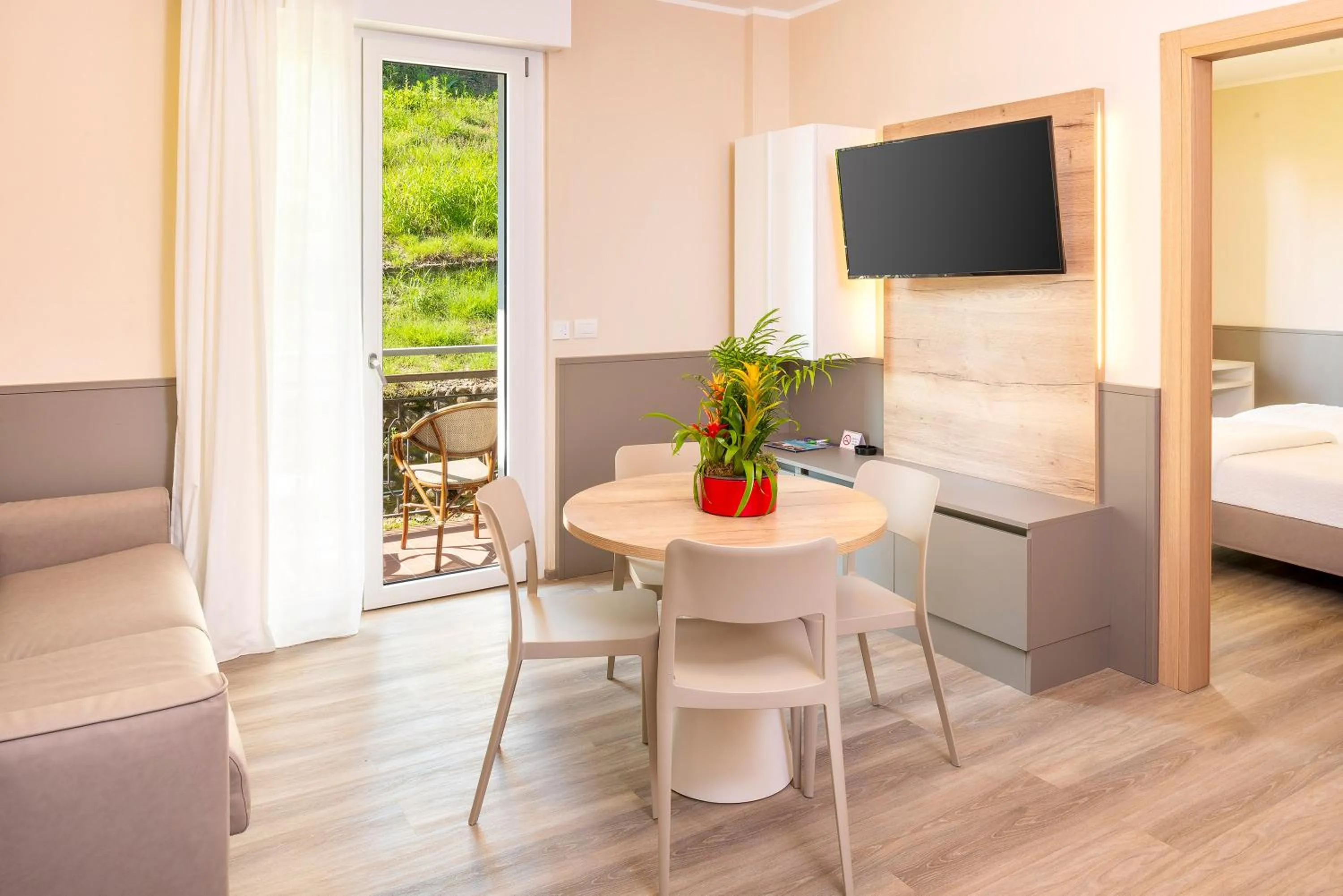 Living room, Bed in Residenza Panorama