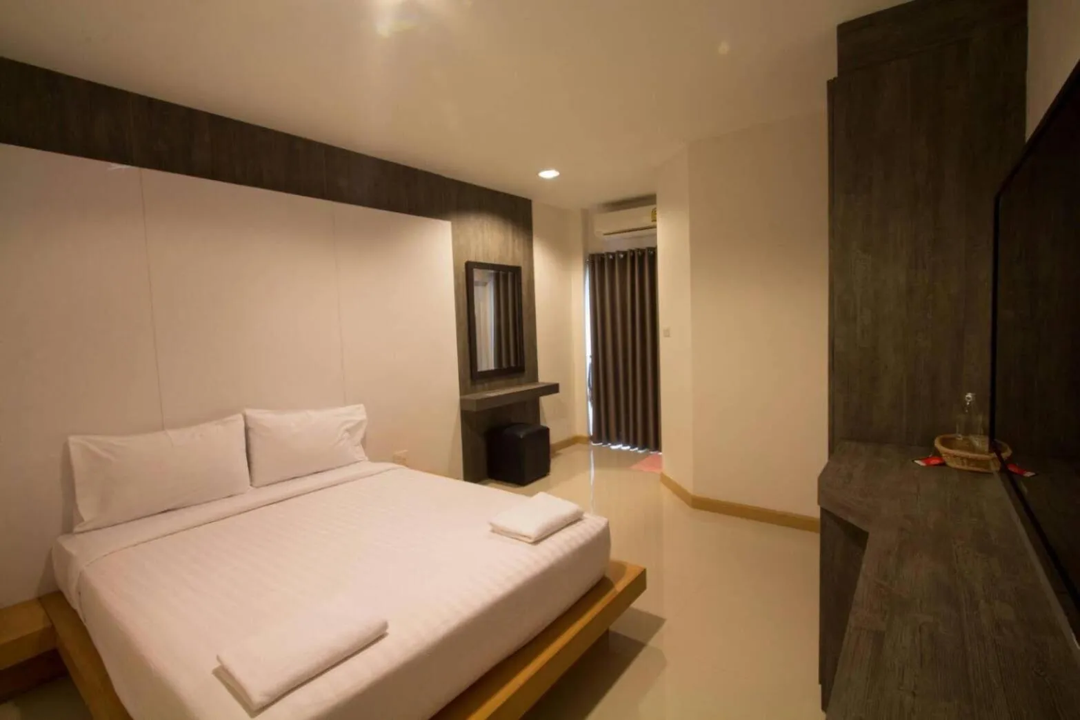 Photo of the whole room, Bed in Fortune Surin Hotel