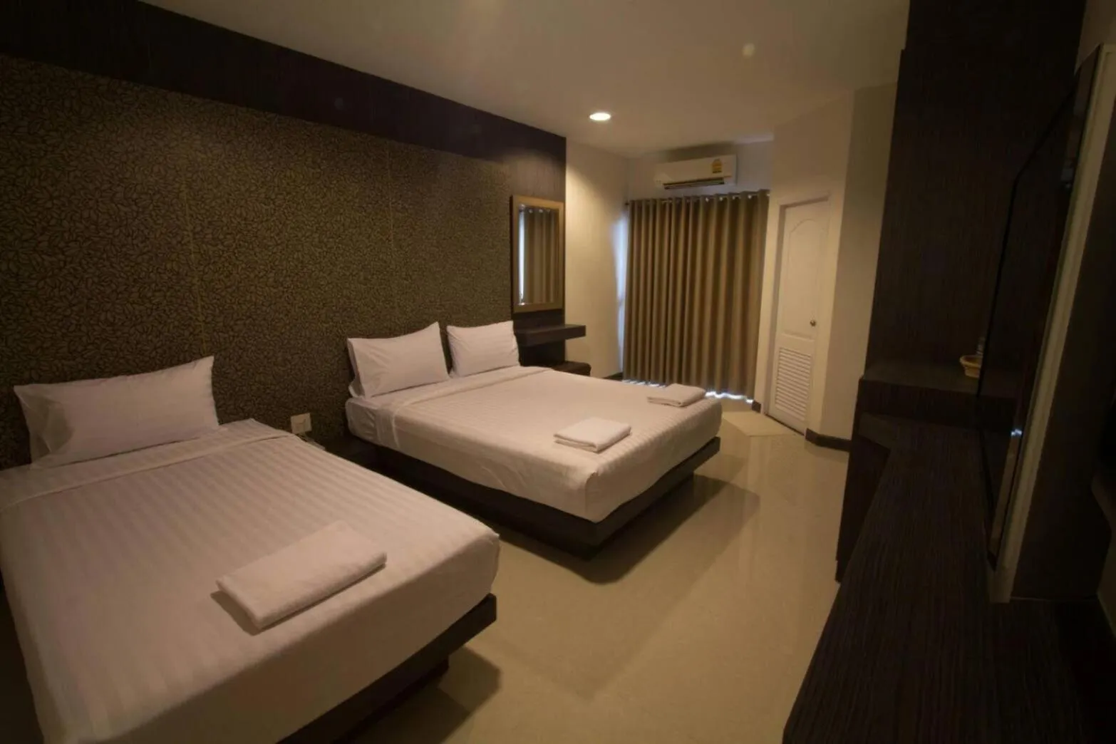 Photo of the whole room, Bed in Fortune Surin Hotel