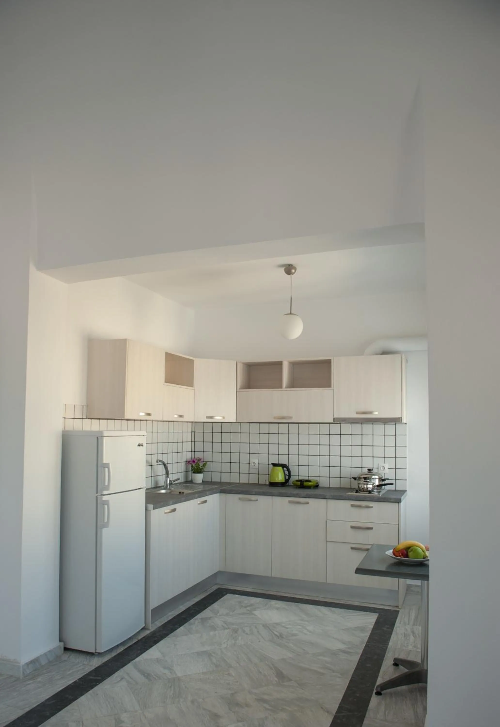 Kitchen or kitchenette in Altea Apartments
