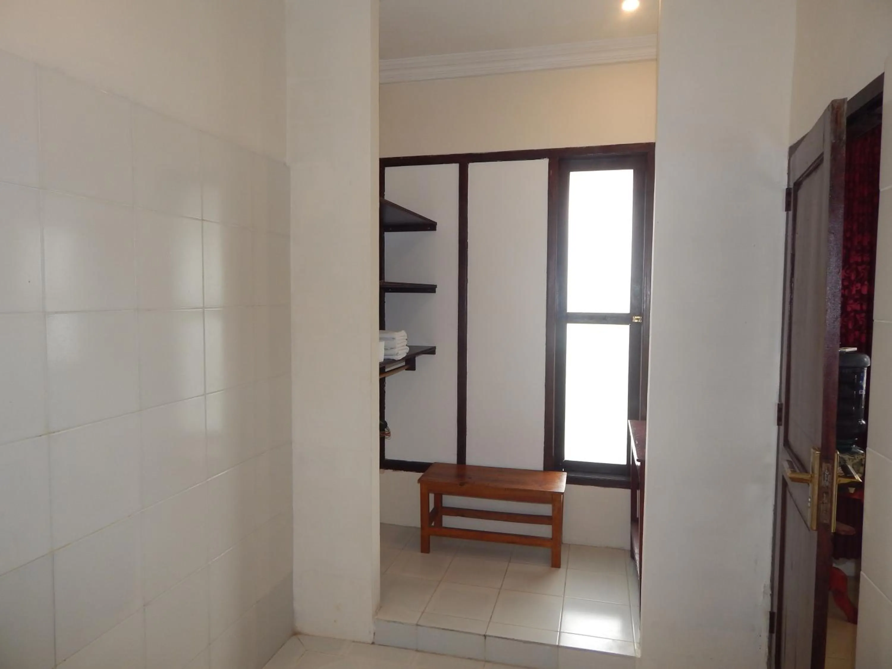 wardrobe in Rosella Cottages - Homestay - Yogyakarta