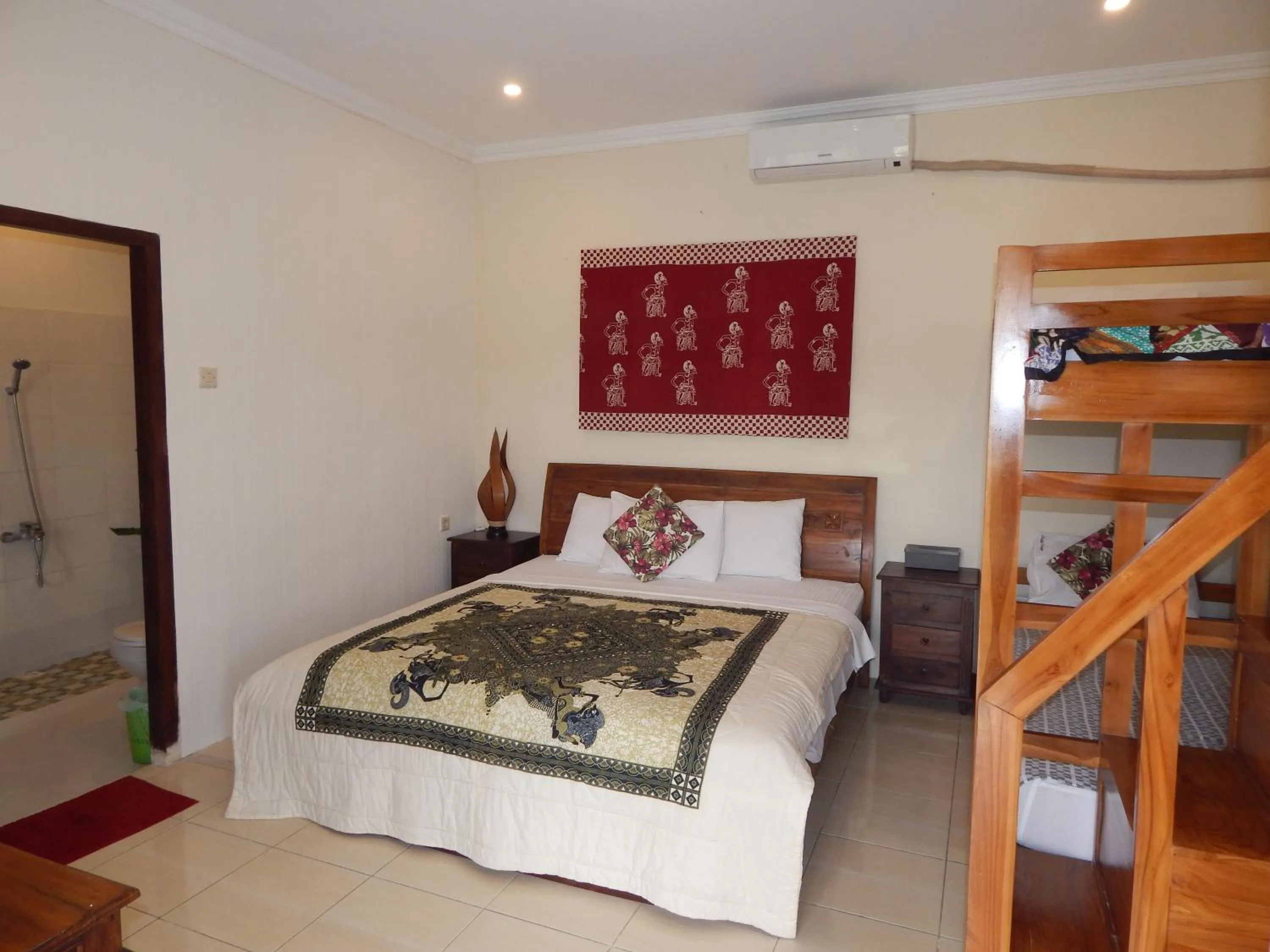 Bedroom, Bed in Rosella Cottages - Homestay - Yogyakarta