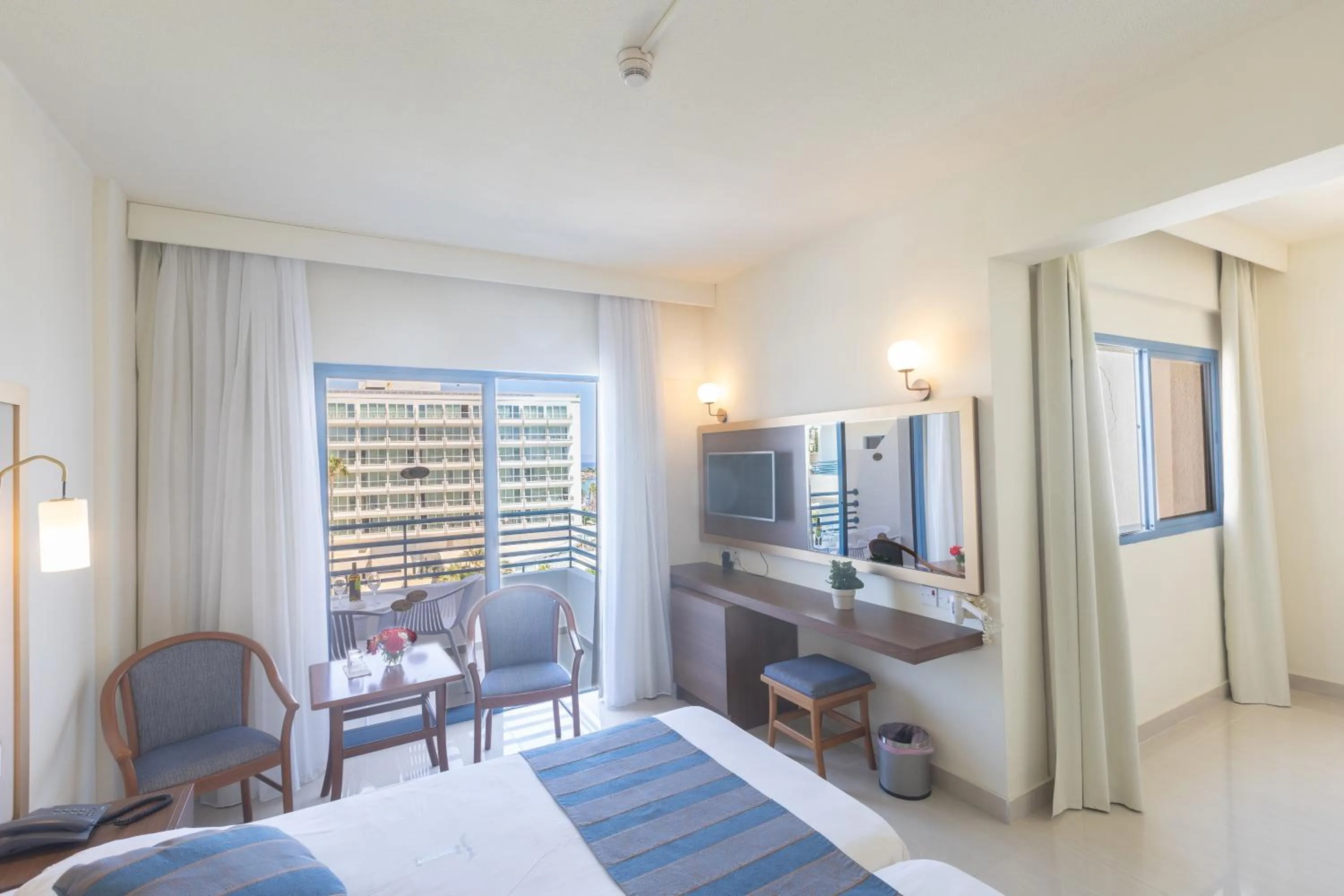 Bed in Iliada Beach Hotel