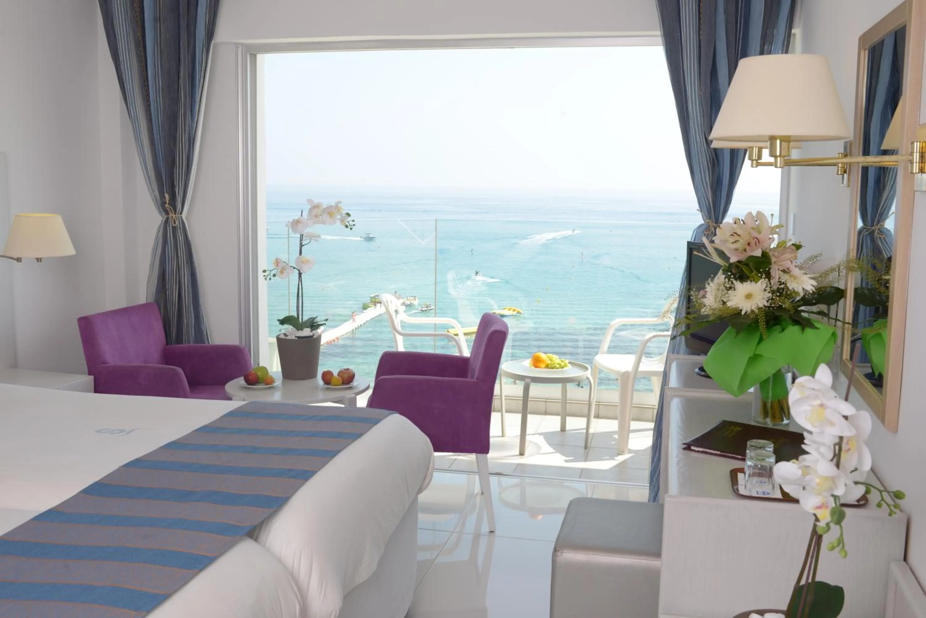 Bed in Silver Sands Beach Hotel