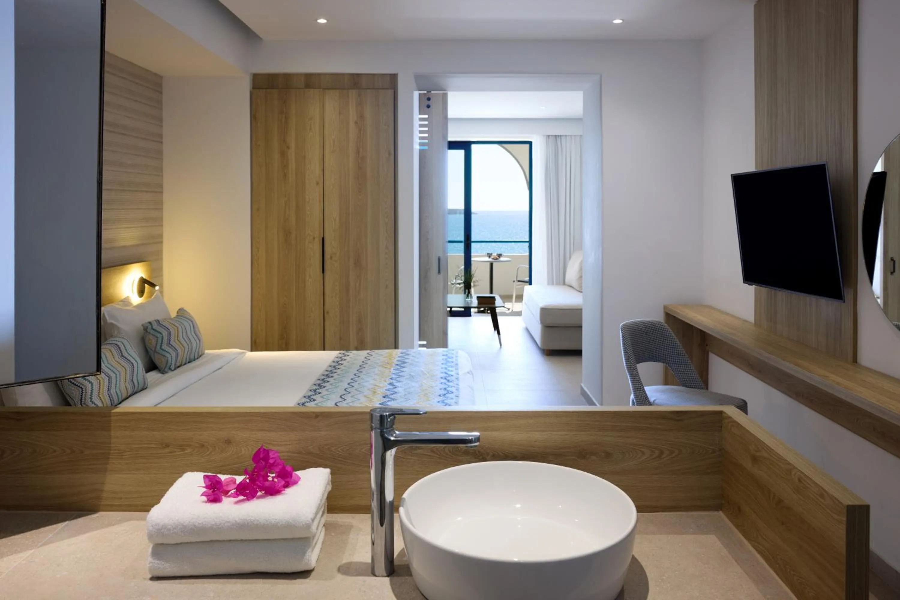 Bed in Sunrise Hotel