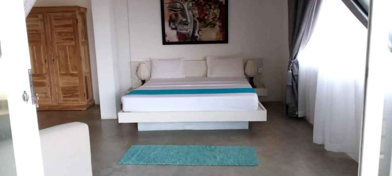 Bed in The Beach house by Kay Jay Hotels