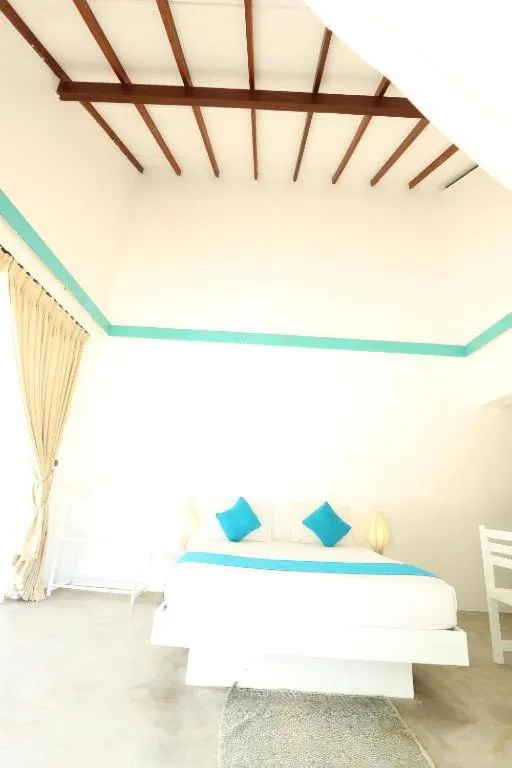 Bed in The Beach house by Kay Jay Hotels