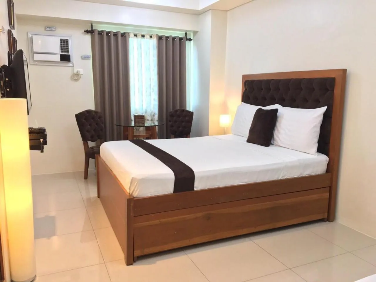 Photo of the whole room, Bed in Studio Unit at The Beacon Makati