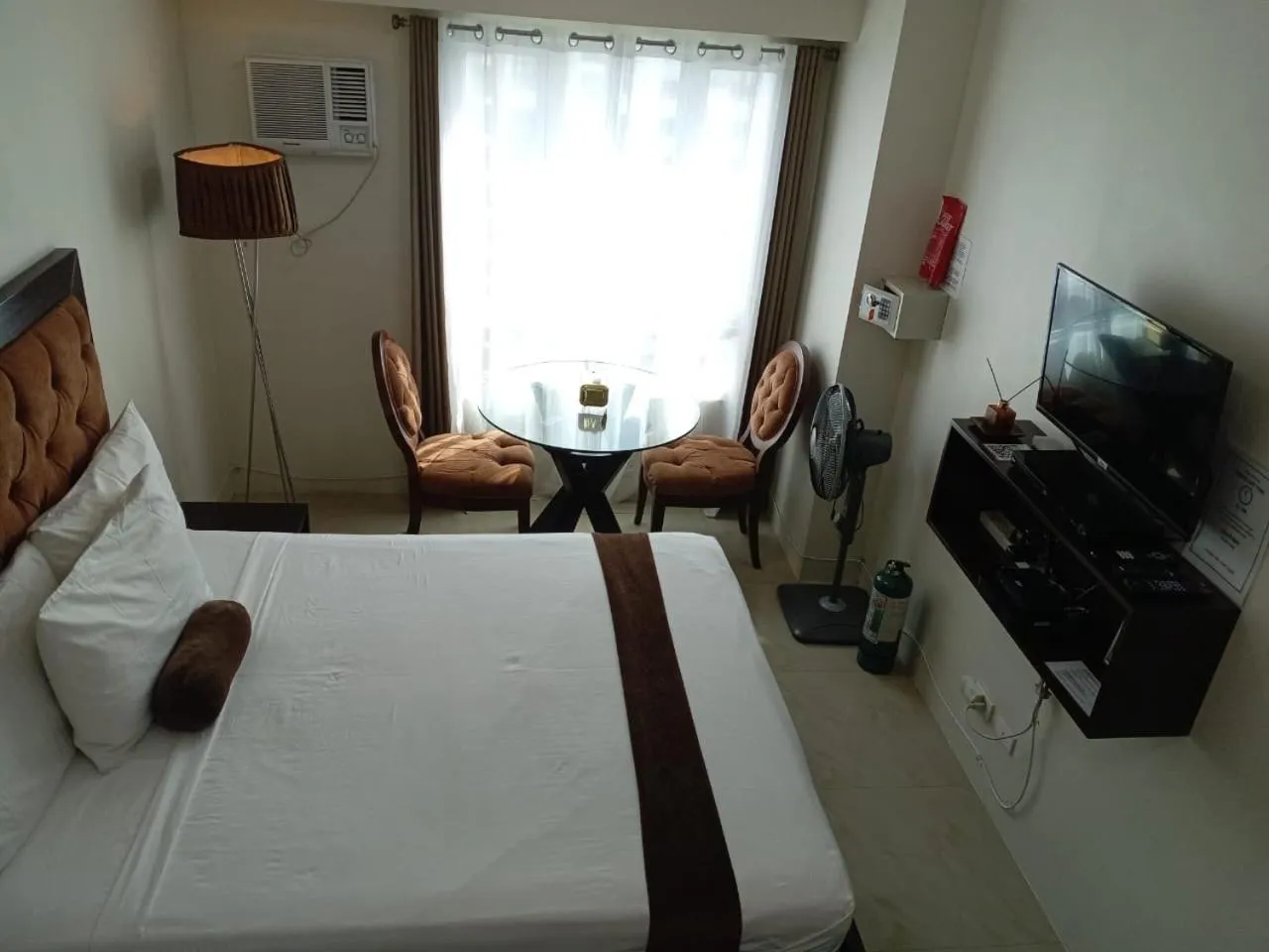 Bed in Studio Unit at The Beacon Makati