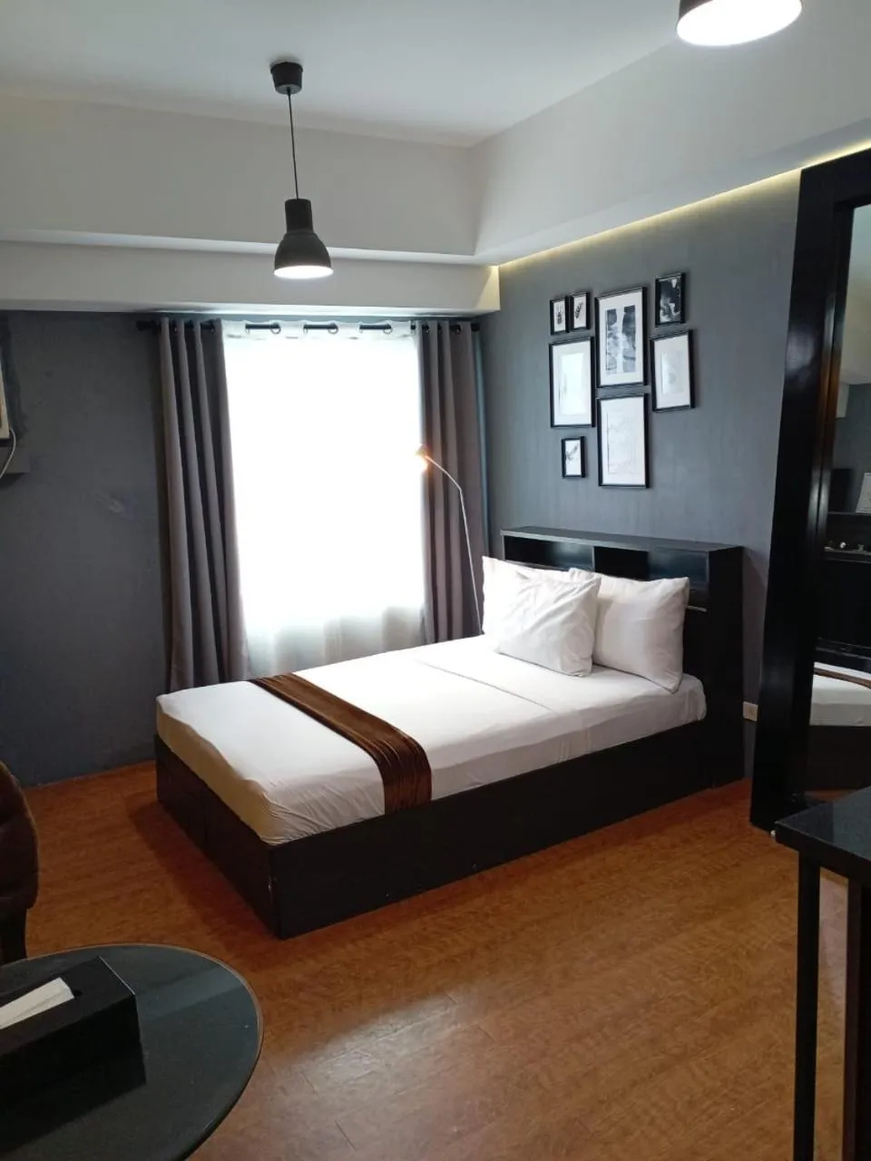 Bed in Studio Unit at The Beacon Makati