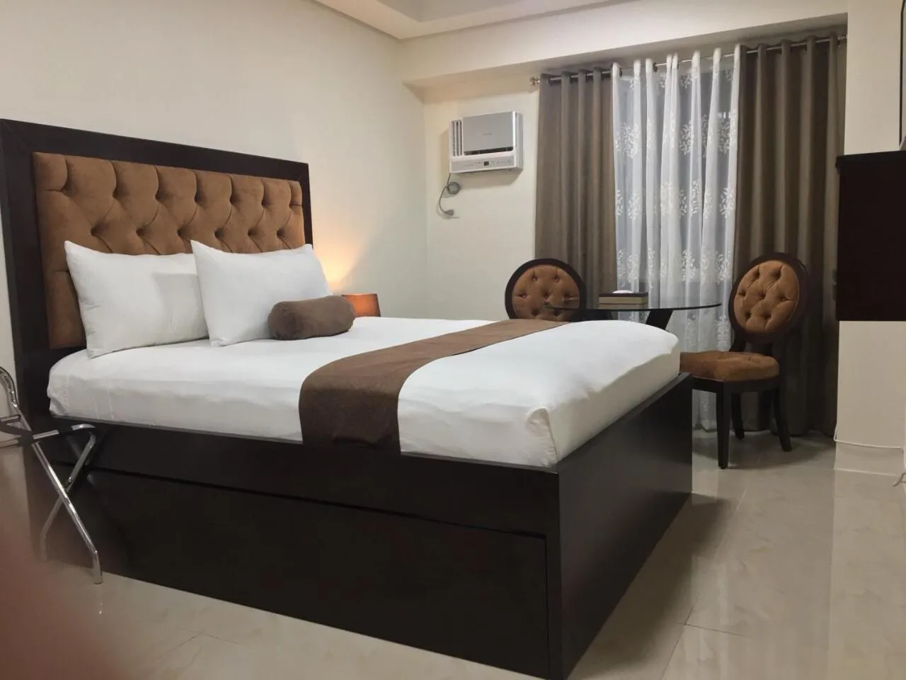 Bed in Studio Unit at The Beacon Makati