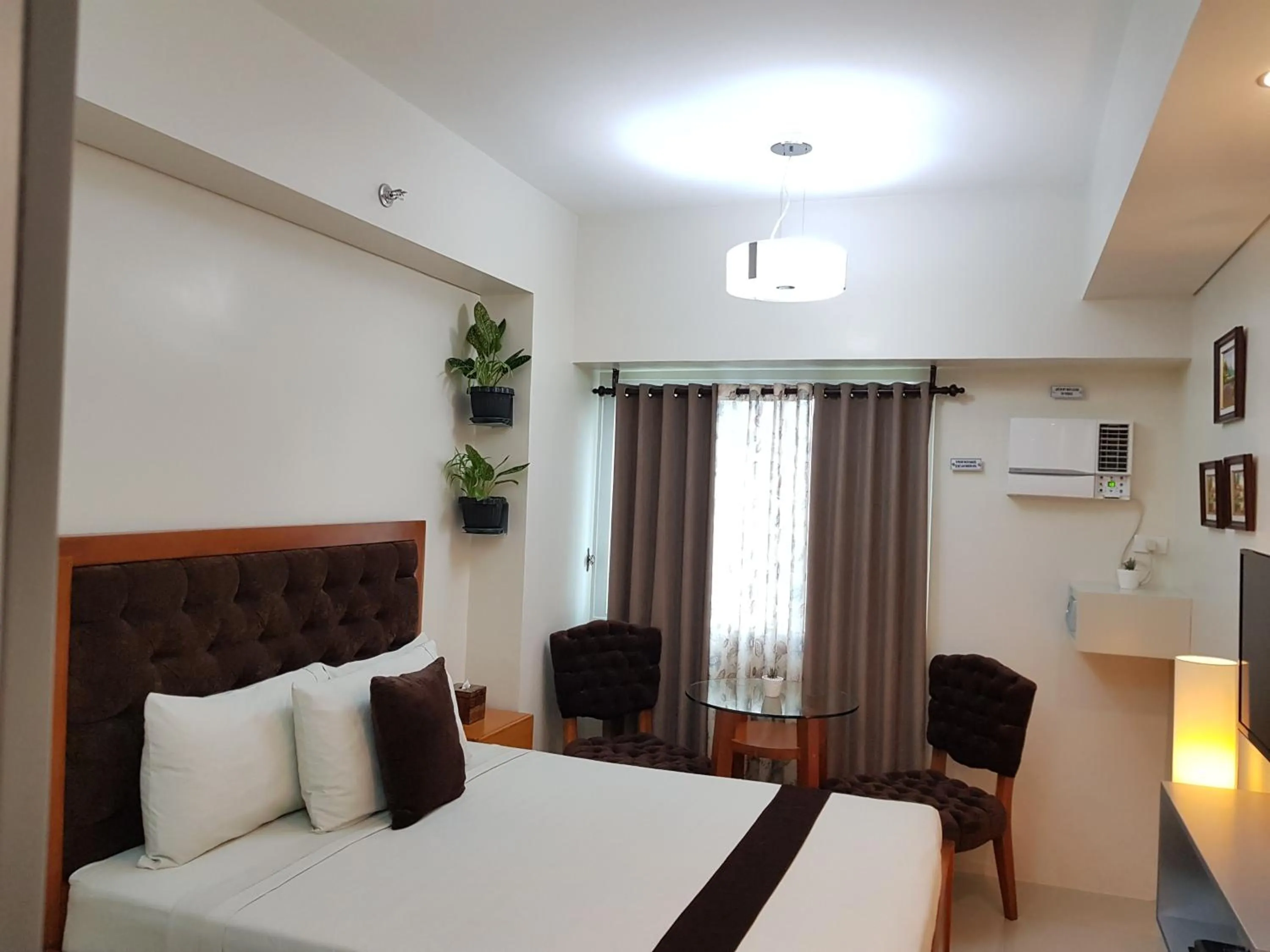 Bed in Studio Unit at The Beacon Makati