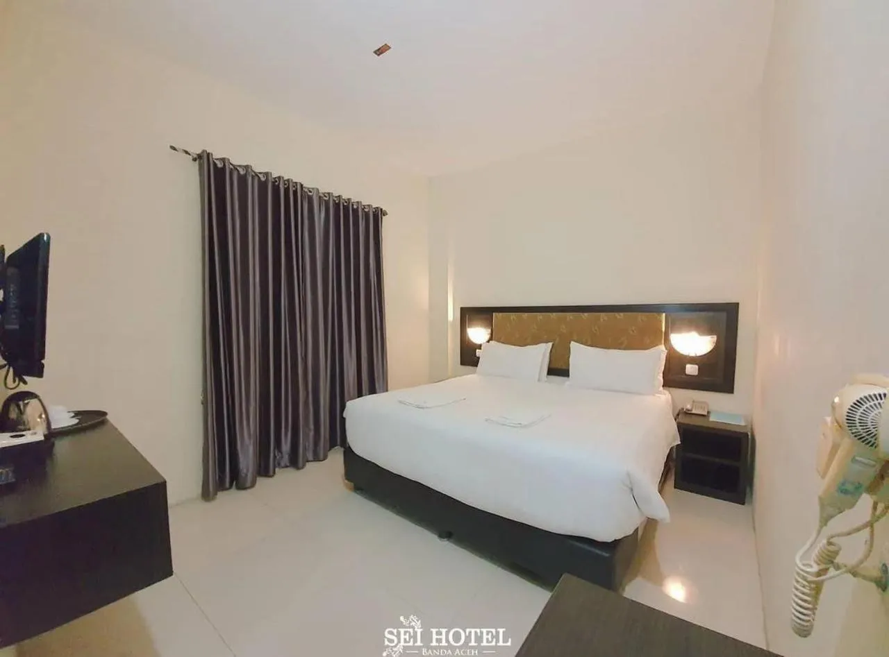 Bed in Sei Hotel Aceh