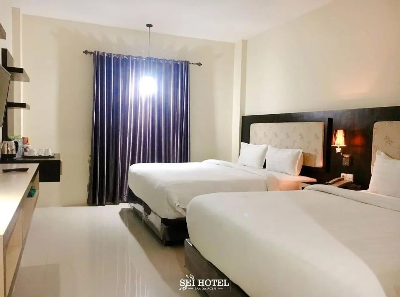 Bed in Sei Hotel Aceh