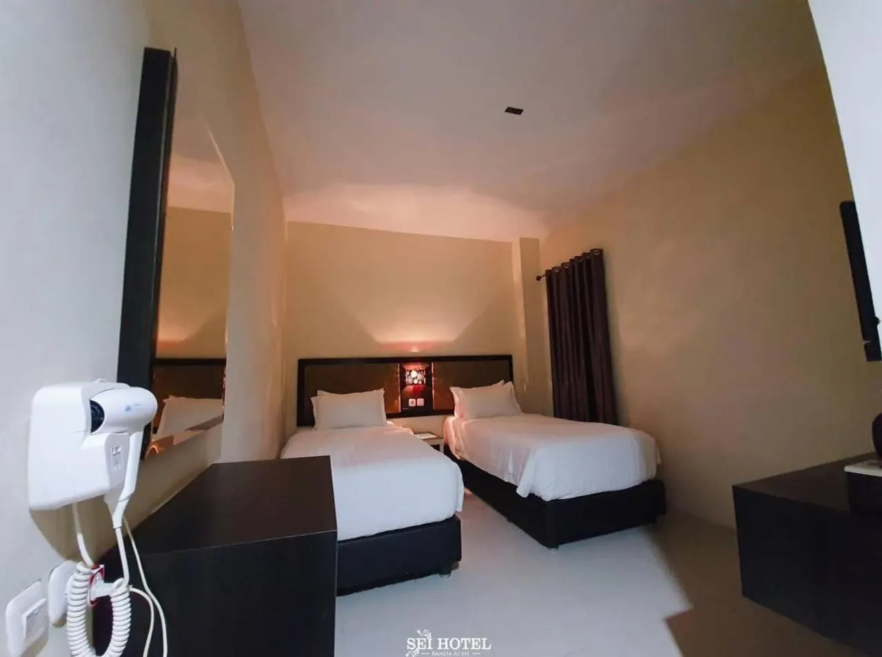 Bed in Sei Hotel Aceh