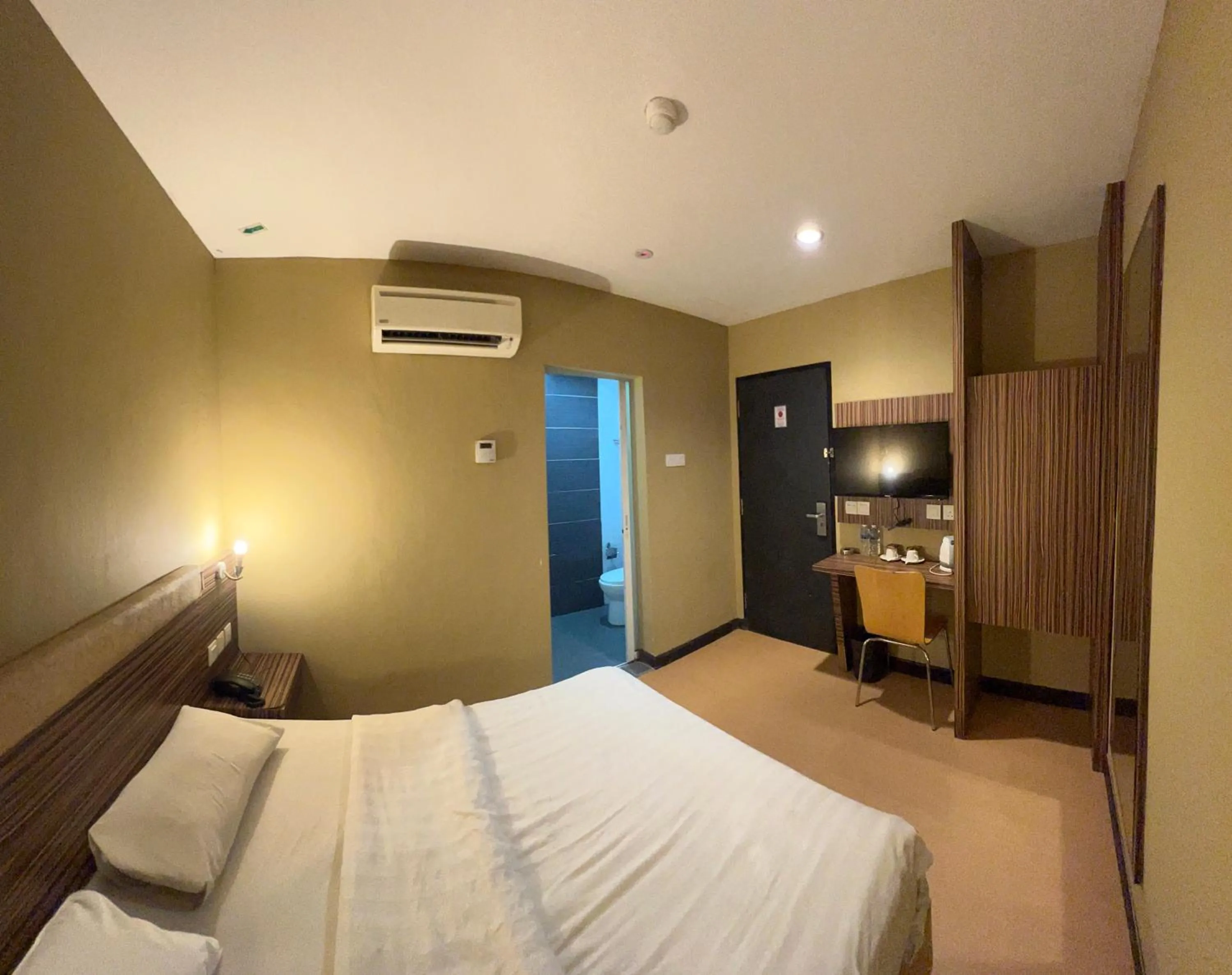 Bedroom, Bed in Havona Hotel - Permas Jaya - Self Check-In