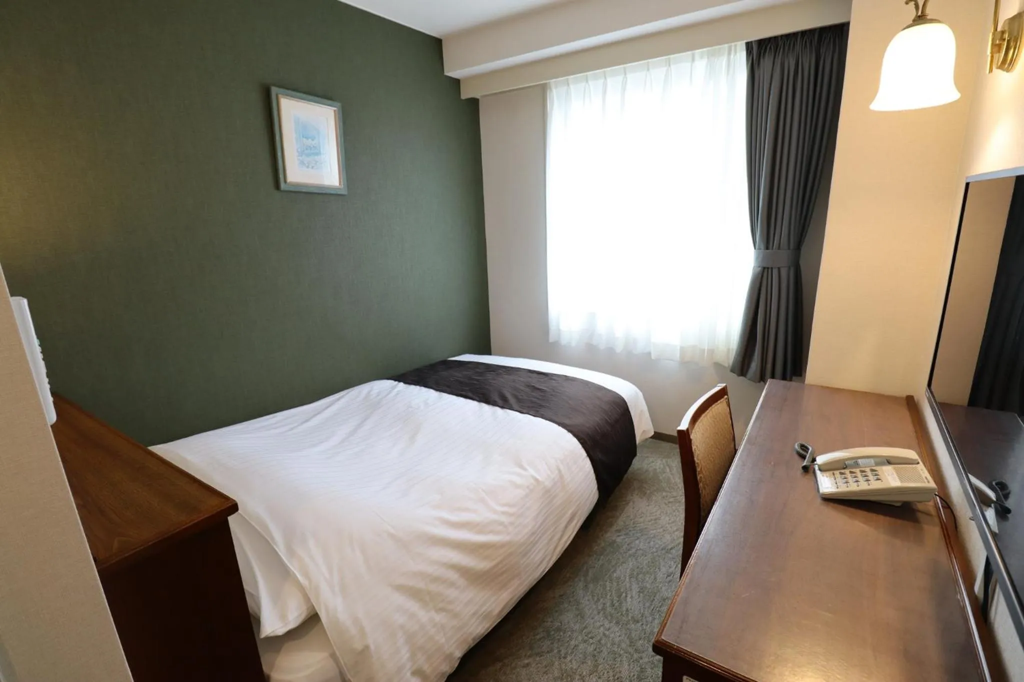 Bed in Imabari Urban Hotel