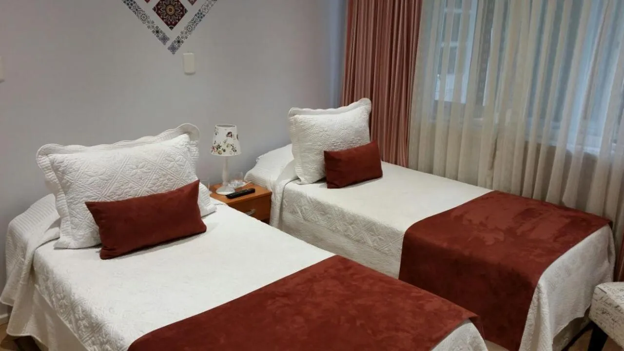 Bed in Hotel Puerta del Lago