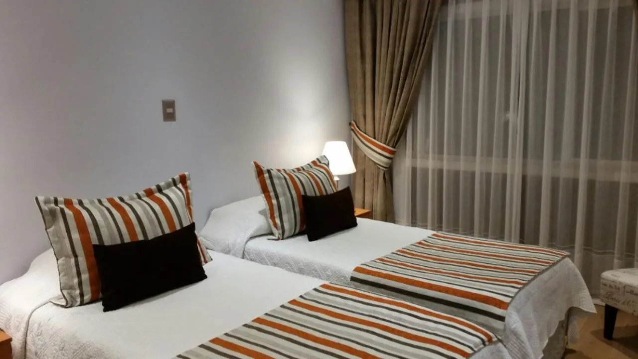 Bed in Hotel Puerta del Lago
