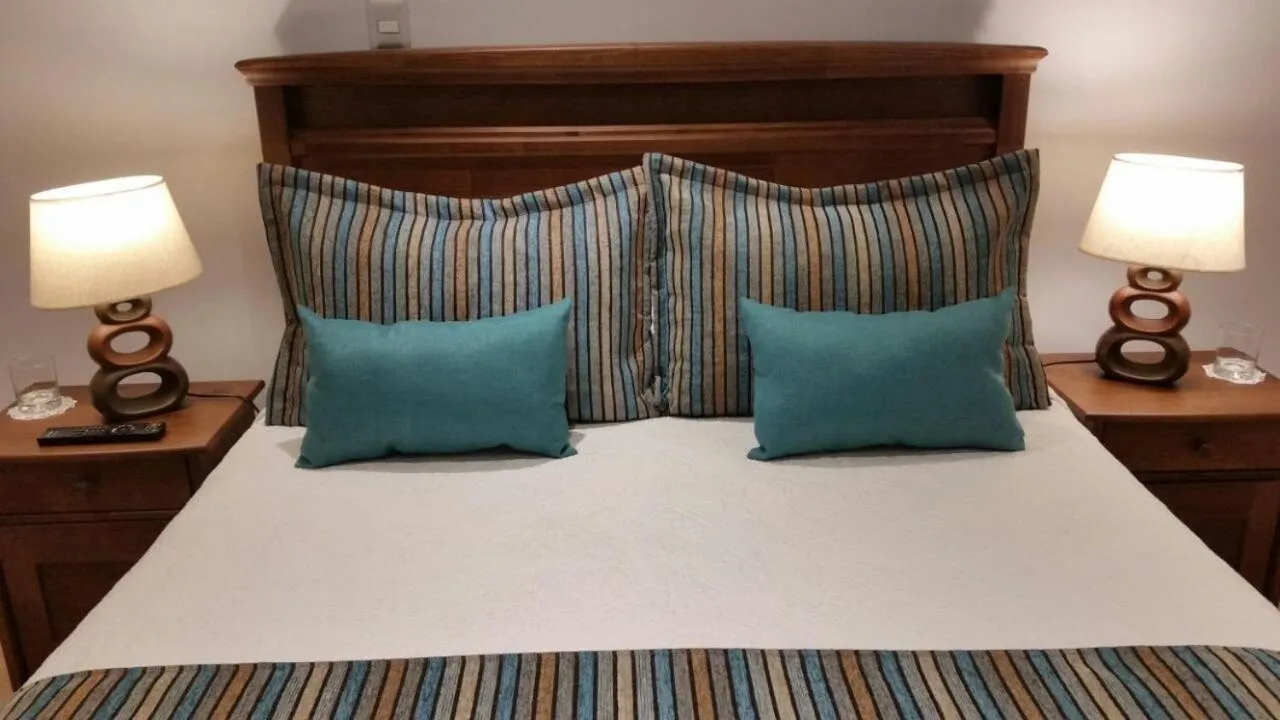 Bed in Hotel Puerta del Lago
