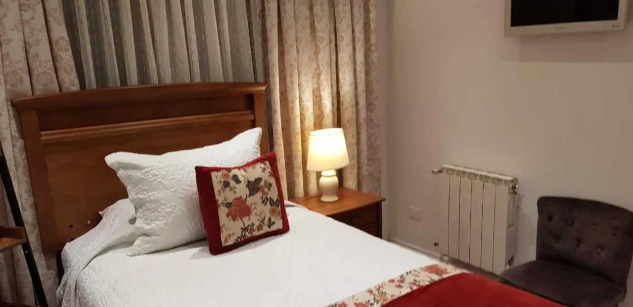 Bed in Hotel Puerta del Lago