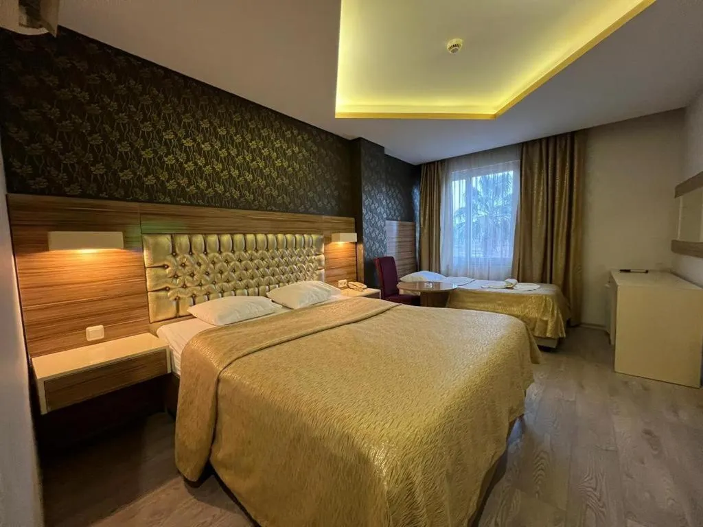 Bed in Grand Ezel Hotel