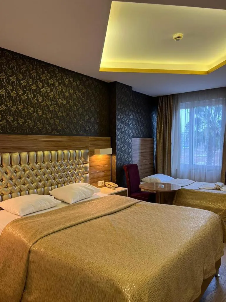 Bed in Grand Ezel Hotel