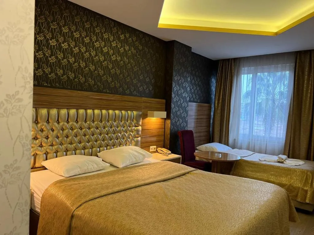 Bed in Grand Ezel Hotel