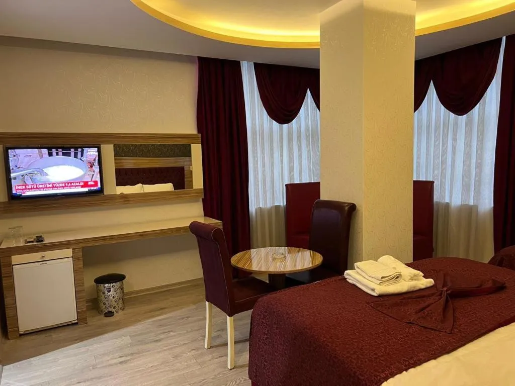 Bed in Grand Ezel Hotel
