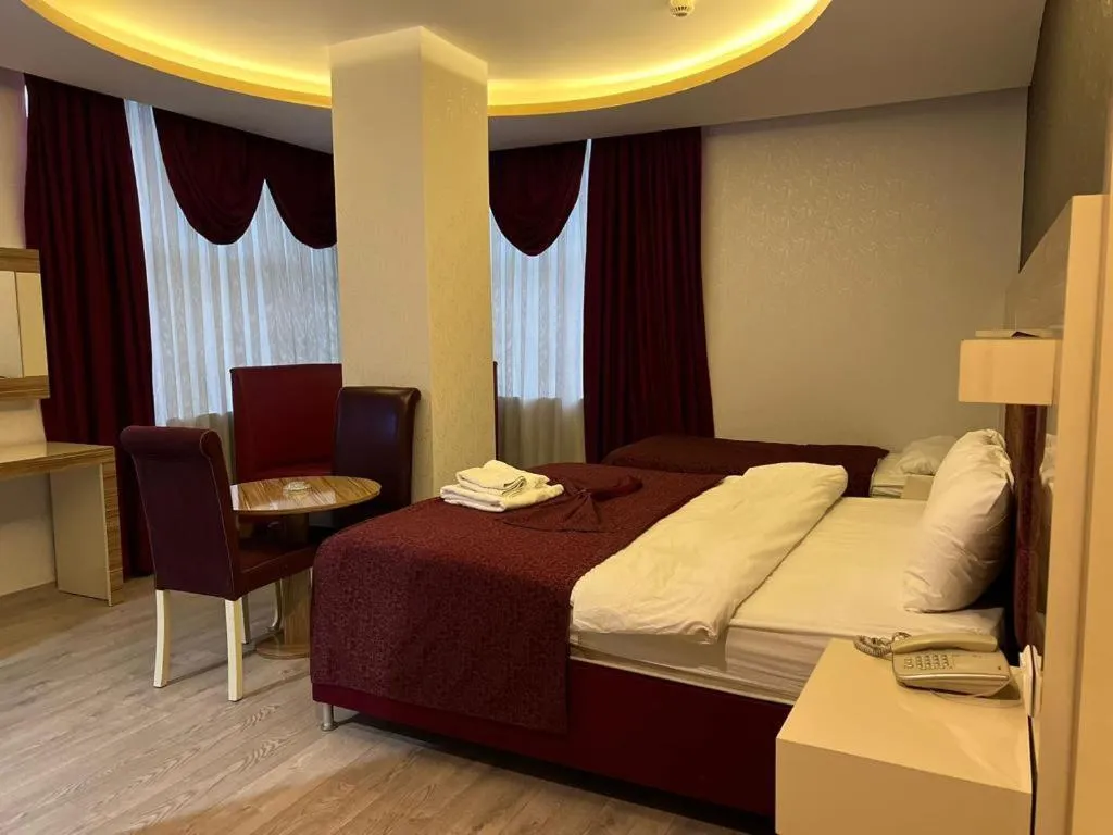 Bed in Grand Ezel Hotel