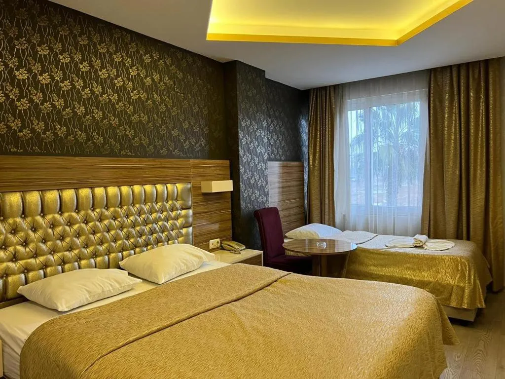 Bed in Grand Ezel Hotel